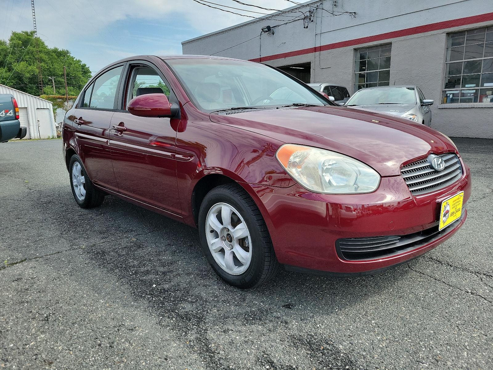 2006 Wine Red Pearl - 5R /Gray - FZ Hyundai Accent GLS (KMHCN46C26U) with an 1.6L DOHC MPI 16-valve I4 engine w/continuously variable valve timing (CVVT) engine, located at 50 Eastern Blvd., Essex, MD, 21221, (410) 686-3444, 39.304367, -76.484947 - <p>Our 2006 Hyundai Elantra GLS Sedan presented in Wine Red Pearl boasts comfort and style. Powered by an efficient 1.6 Liter 4 Cylinder connected to a 5 Speed Automatic transmission. Our Front Wheel Drive Sedan boasts nearly 36mpg on the open road and turns heads with its timeless styling. </p><p>< - Photo #2