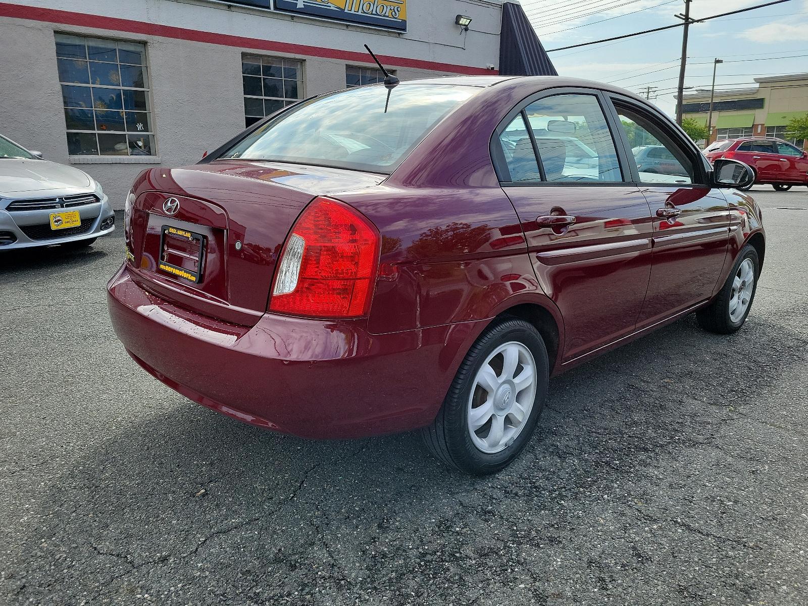 2006 Wine Red Pearl - 5R /Gray - FZ Hyundai Accent GLS (KMHCN46C26U) with an 1.6L DOHC MPI 16-valve I4 engine w/continuously variable valve timing (CVVT) engine, located at 50 Eastern Blvd., Essex, MD, 21221, (410) 686-3444, 39.304367, -76.484947 - <p>Our 2006 Hyundai Elantra GLS Sedan presented in Wine Red Pearl boasts comfort and style. Powered by an efficient 1.6 Liter 4 Cylinder connected to a 5 Speed Automatic transmission. Our Front Wheel Drive Sedan boasts nearly 36mpg on the open road and turns heads with its timeless styling. </p><p>< - Photo #3