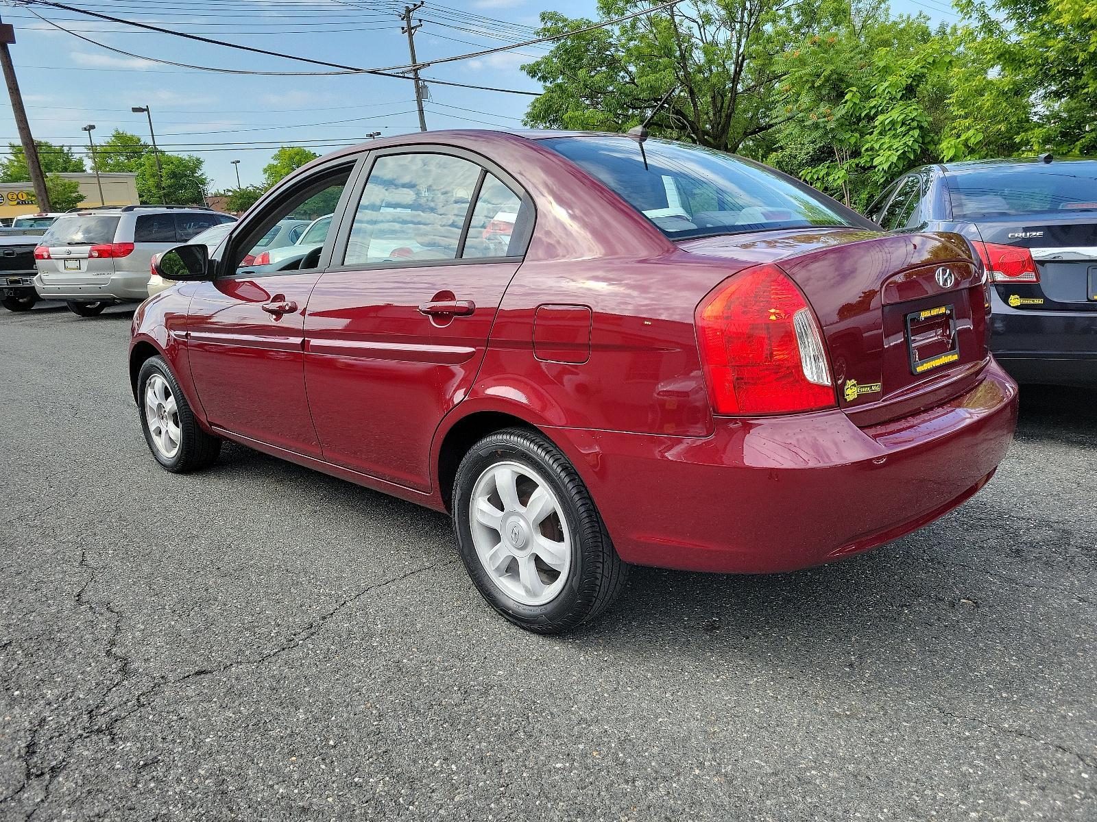 2006 Wine Red Pearl - 5R /Gray - FZ Hyundai Accent GLS (KMHCN46C26U) with an 1.6L DOHC MPI 16-valve I4 engine w/continuously variable valve timing (CVVT) engine, located at 50 Eastern Blvd., Essex, MD, 21221, (410) 686-3444, 39.304367, -76.484947 - <p>Our 2006 Hyundai Elantra GLS Sedan presented in Wine Red Pearl boasts comfort and style. Powered by an efficient 1.6 Liter 4 Cylinder connected to a 5 Speed Automatic transmission. Our Front Wheel Drive Sedan boasts nearly 36mpg on the open road and turns heads with its timeless styling. </p><p>< - Photo #5