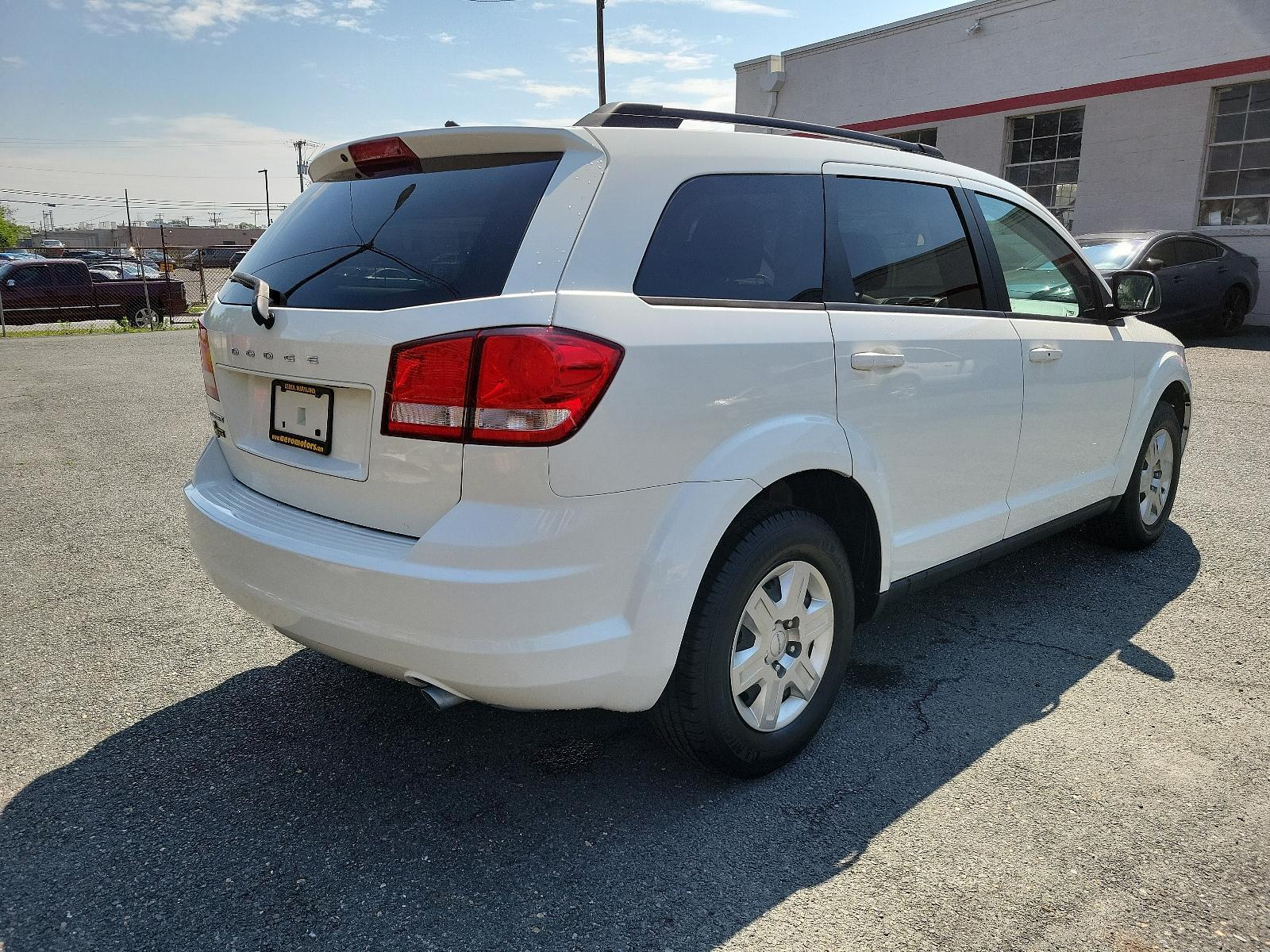 2011 White - PW3 /Black Interior - E5X9 Dodge Journey Express (3D4PG4FB3BT) with an 2.4L DOHC DUAL VVT 16-VALVE I4 ENGINE engine, located at 50 Eastern Blvd., Essex, MD, 21221, (410) 686-3444, 39.304367, -76.484947 - <p>Our attractive 2011 Dodge Journey Express Crossover is shown in White. Motived by our 2.4 Liter 4 Cylinder that offers 173hp connected to a 4 Speed AutoStick transmission for the ability to put it in Drive and forget or run through the gears with the flip of your wrist for that sports car feel. T - Photo #3