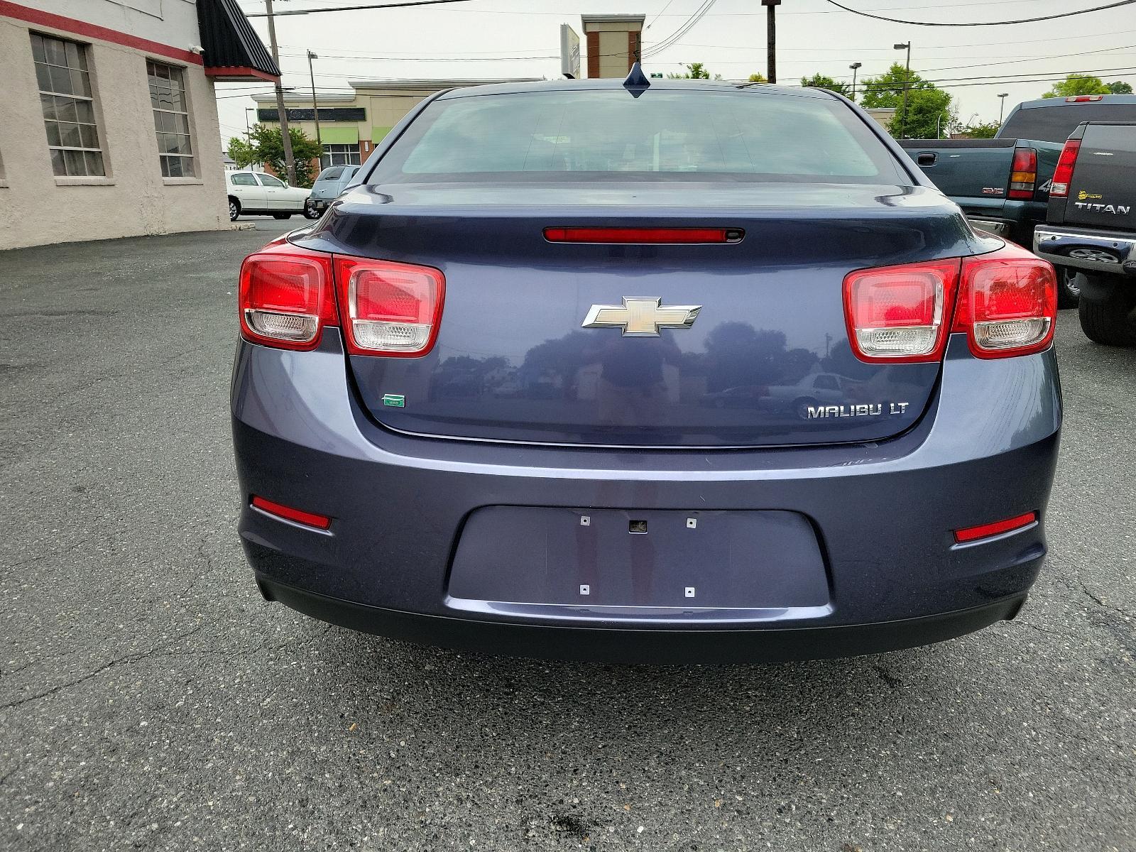 2014 Atlantis Blue Metallic - GWY /Jet Black/Titanium - AFG Chevrolet Malibu LT (1G11C5SLXEF) with an ENGINE, ECOTEC 2.5L DOHC 4-CYLINDER DI engine, located at 50 Eastern Blvd., Essex, MD, 21221, (410) 686-3444, 39.304367, -76.484947 - <p>Our 2014 Chevrolet Malibu 1LT Sedan shown in Atlantis Blue Metallic offers striking good looks, superb fuel efficiency, and awesome reliability! Powered by a 2.5 Liter Ecotec 4 Cylinder offering 197hp coupled to an advanced 6 Speed Automatic transmission providing top-notch function. Each swoop a - Photo #4