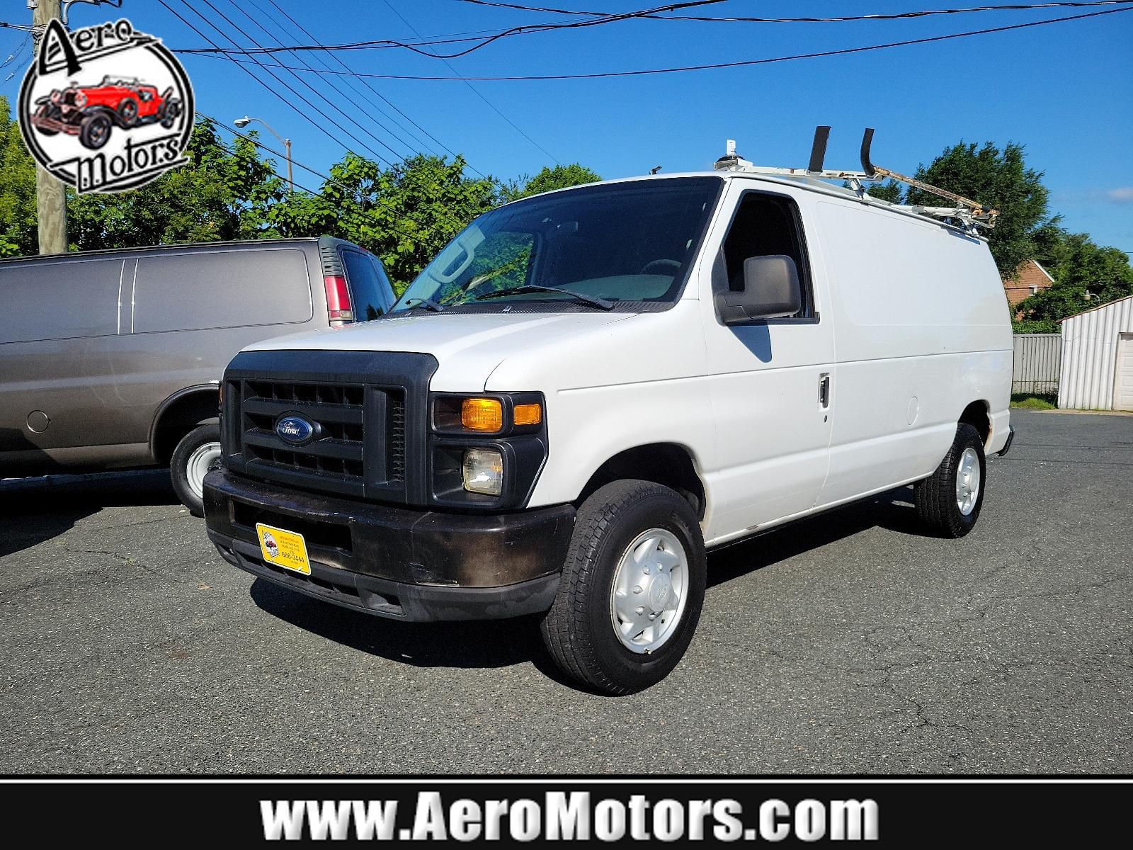 2008 Oxford White - YZ /Medium flint - AE Ford Econoline Cargo Van Commercial (1FTNE24L98D) with an 5.4L SOHC EFI V8 "TRITON" ENGINE engine, located at 50 Eastern Blvd., Essex, MD, 21221, (410) 686-3444, 39.304367, -76.484947 - <p>This extremely versatile 2008 Ford E-150 Econoline E-250 Commercial Cargo Van in Summit White will prove a worthy work companion from the first drive! Powered by a 5.4 Liter Triton V8 generating 225hp connected to a 4 Speed Automatic transmission. Confident and nimble, this Rear Wheel Drive Van e - Photo #0