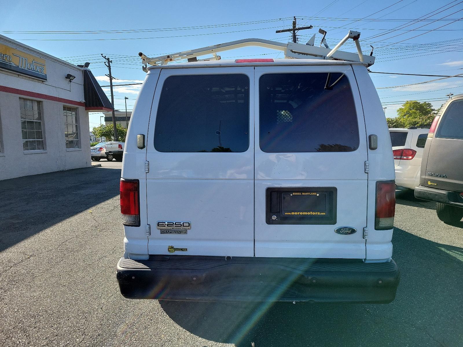 2008 Oxford White - YZ /Medium flint - AE Ford Econoline Cargo Van Commercial (1FTNE24L98D) with an 5.4L SOHC EFI V8 "TRITON" ENGINE engine, located at 50 Eastern Blvd., Essex, MD, 21221, (410) 686-3444, 39.304367, -76.484947 - <p>This extremely versatile 2008 Ford E-150 Econoline E-250 Commercial Cargo Van in Summit White will prove a worthy work companion from the first drive! Powered by a 5.4 Liter Triton V8 generating 225hp connected to a 4 Speed Automatic transmission. Confident and nimble, this Rear Wheel Drive Van e - Photo #4