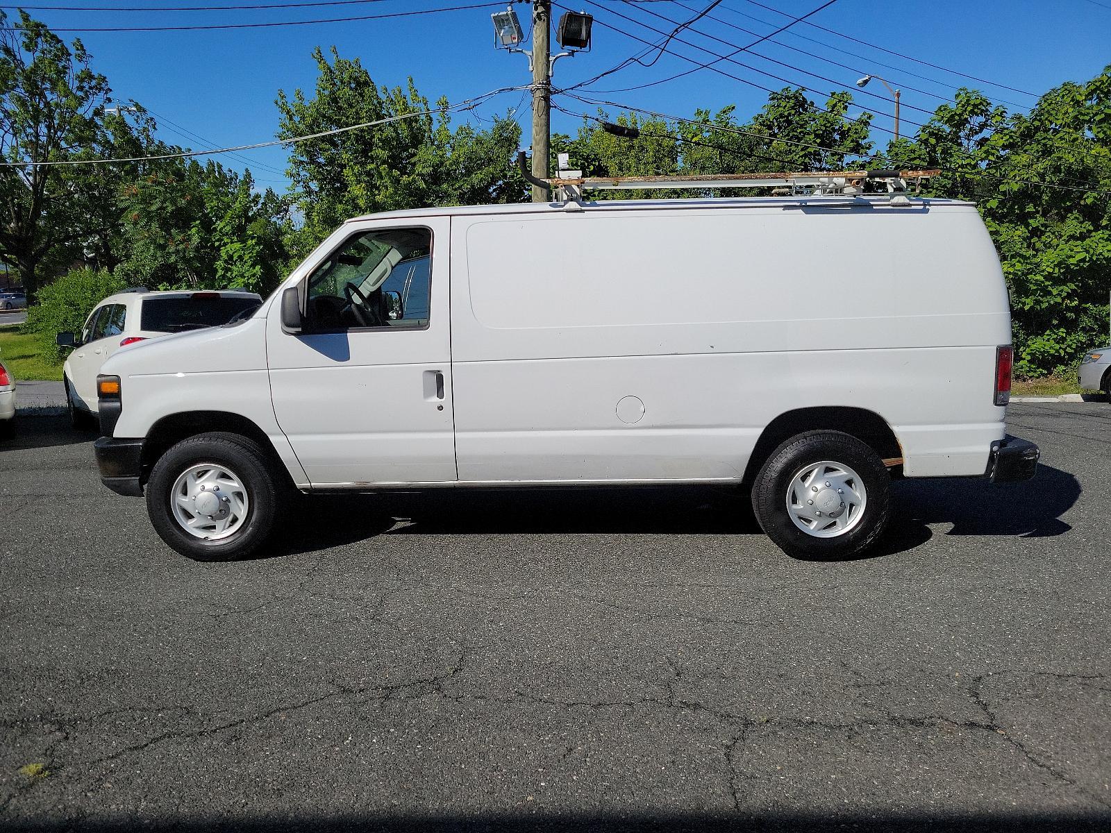 2008 Oxford White - YZ /Medium flint - AE Ford Econoline Cargo Van Commercial (1FTNE24L98D) with an 5.4L SOHC EFI V8 "TRITON" ENGINE engine, located at 50 Eastern Blvd., Essex, MD, 21221, (410) 686-3444, 39.304367, -76.484947 - <p>This extremely versatile 2008 Ford E-150 Econoline E-250 Commercial Cargo Van in Summit White will prove a worthy work companion from the first drive! Powered by a 5.4 Liter Triton V8 generating 225hp connected to a 4 Speed Automatic transmission. Confident and nimble, this Rear Wheel Drive Van e - Photo #6