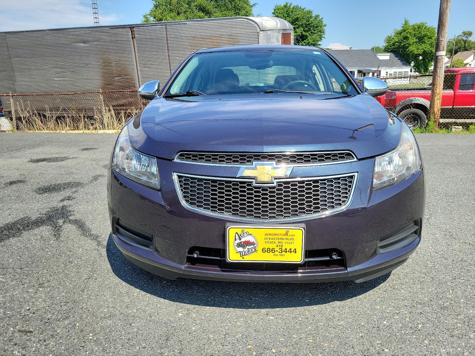2014 Blue Ray Metallic - GXH /Jet Black/Medium Titanium - AFB Chevrolet Cruze LS (1G1PA5SG9E7) with an ENGINE, ECOTEC 1.8L VARIABLE VALVE TIMING DOHC 4-CYLINDER SEQUENTIAL MFI engine, located at 50 Eastern Blvd., Essex, MD, 21221, (410) 686-3444, 39.304367, -76.484947 - <p>Our great looking 2014 Chevrolet Cruze LS Sedan, with its elegant style and sporty stance, is displayed in Blue Ray Metallic. Powered by a 1.8 Liter 4 Cylinder that delivers 138hp connected to a smooth-shifting 6 Speed Automatic transmission. This Front Wheel Drive has an agile suspension that gr - Photo #1