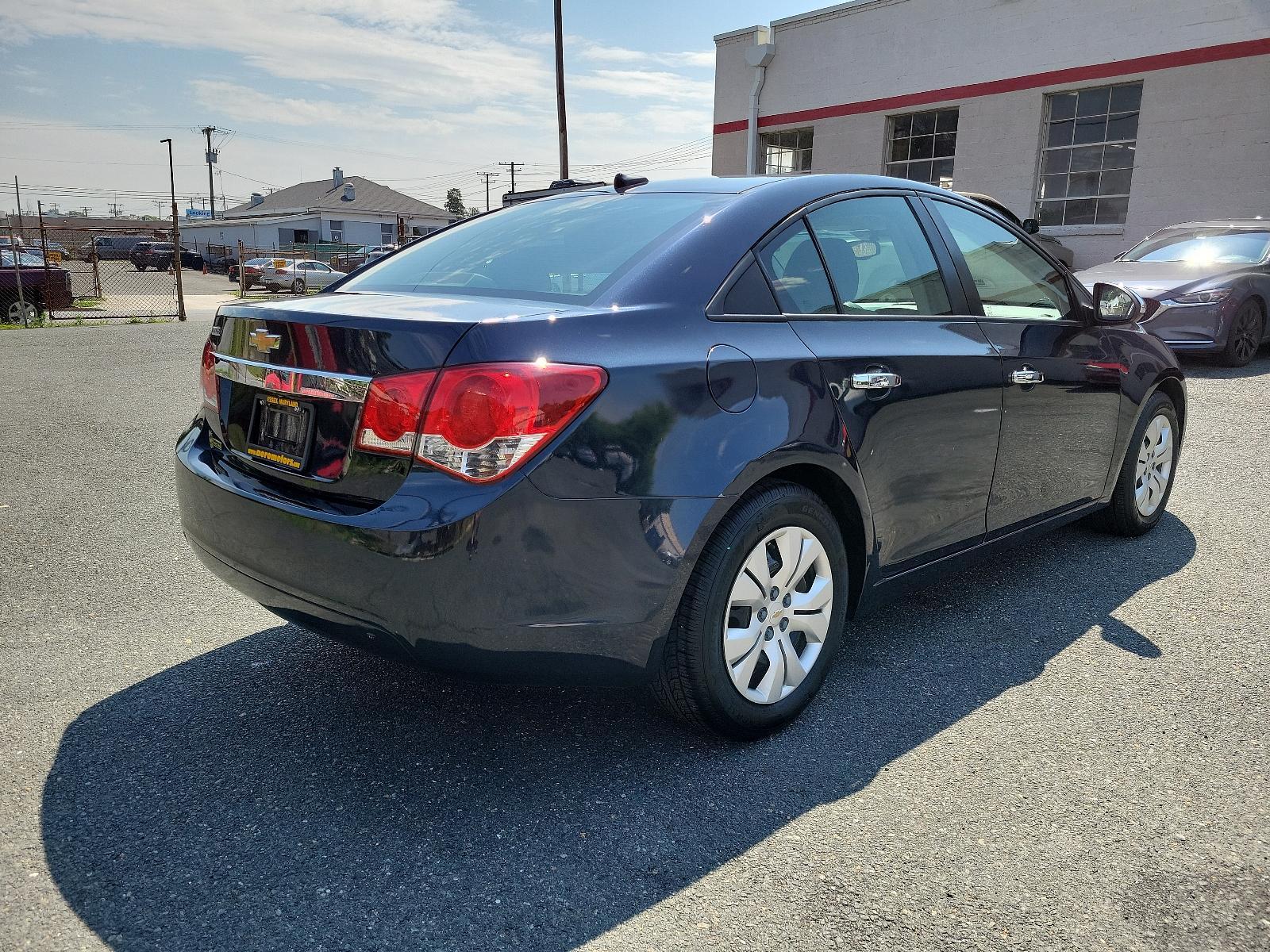 2014 Blue Ray Metallic - GXH /Jet Black/Medium Titanium - AFB Chevrolet Cruze LS (1G1PA5SG9E7) with an ENGINE, ECOTEC 1.8L VARIABLE VALVE TIMING DOHC 4-CYLINDER SEQUENTIAL MFI engine, located at 50 Eastern Blvd., Essex, MD, 21221, (410) 686-3444, 39.304367, -76.484947 - <p>Our great looking 2014 Chevrolet Cruze LS Sedan, with its elegant style and sporty stance, is displayed in Blue Ray Metallic. Powered by a 1.8 Liter 4 Cylinder that delivers 138hp connected to a smooth-shifting 6 Speed Automatic transmission. This Front Wheel Drive has an agile suspension that gr - Photo #3