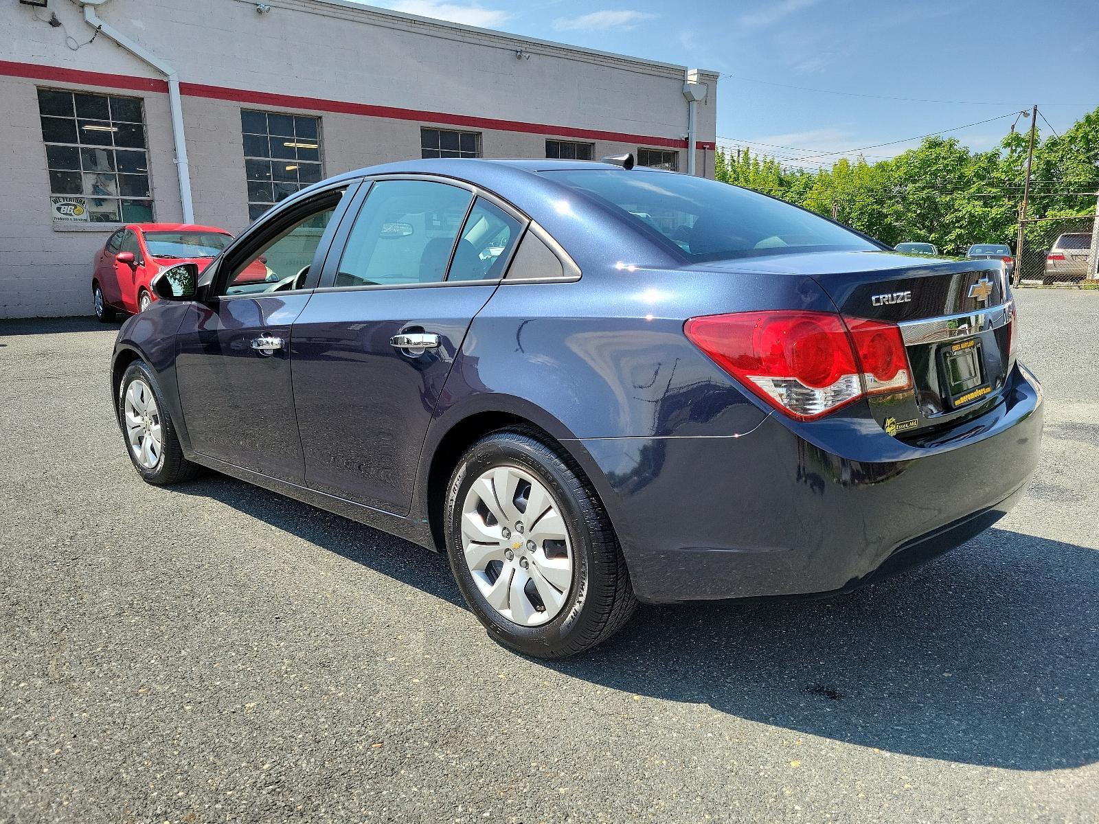 2014 Blue Ray Metallic - GXH /Jet Black/Medium Titanium - AFB Chevrolet Cruze LS (1G1PA5SG9E7) with an ENGINE, ECOTEC 1.8L VARIABLE VALVE TIMING DOHC 4-CYLINDER SEQUENTIAL MFI engine, located at 50 Eastern Blvd., Essex, MD, 21221, (410) 686-3444, 39.304367, -76.484947 - <p>Our great looking 2014 Chevrolet Cruze LS Sedan, with its elegant style and sporty stance, is displayed in Blue Ray Metallic. Powered by a 1.8 Liter 4 Cylinder that delivers 138hp connected to a smooth-shifting 6 Speed Automatic transmission. This Front Wheel Drive has an agile suspension that gr - Photo #5