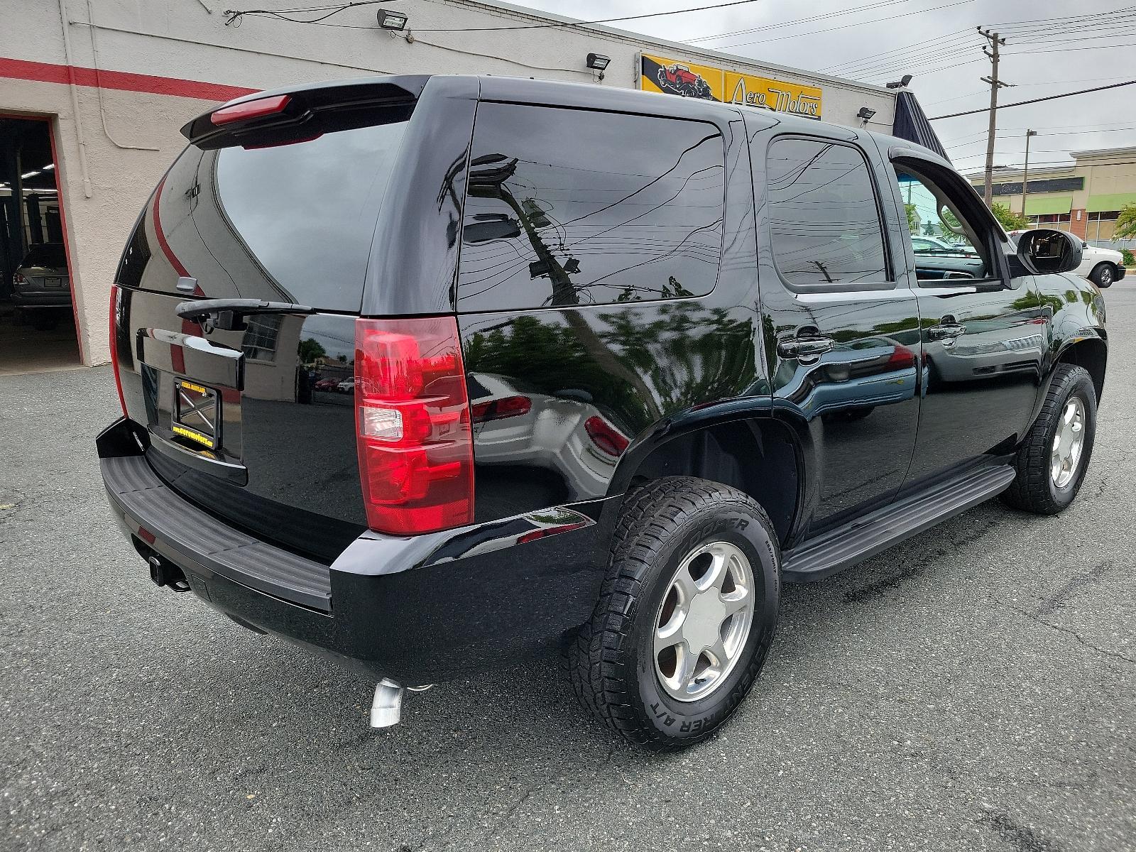 2008 Onyx Black - 41U /Ebony - 19D GMC Yukon SLE w/3SB (1GKFK13008J) with an ENGINE, VORTEC 5.3L V8 SFI FLEXFUEL WITH ACTIVE FUEL MANAGEMENT engine, located at 50 Eastern Blvd., Essex, MD, 21221, (410) 686-3444, 39.304367, -76.484947 - <p>This 2008 GMC Yukon SLE w/3SB 4WD in Onyx Black boasts a level of refinement that surpasses all your expectations. Powered by a 5.3 Liter V8 generating 320hp connected to a 4 Speed Automatic transmission. This Four Wheel Drive SUV is an excellent choice for road trips and adventures, earning near - Photo #3