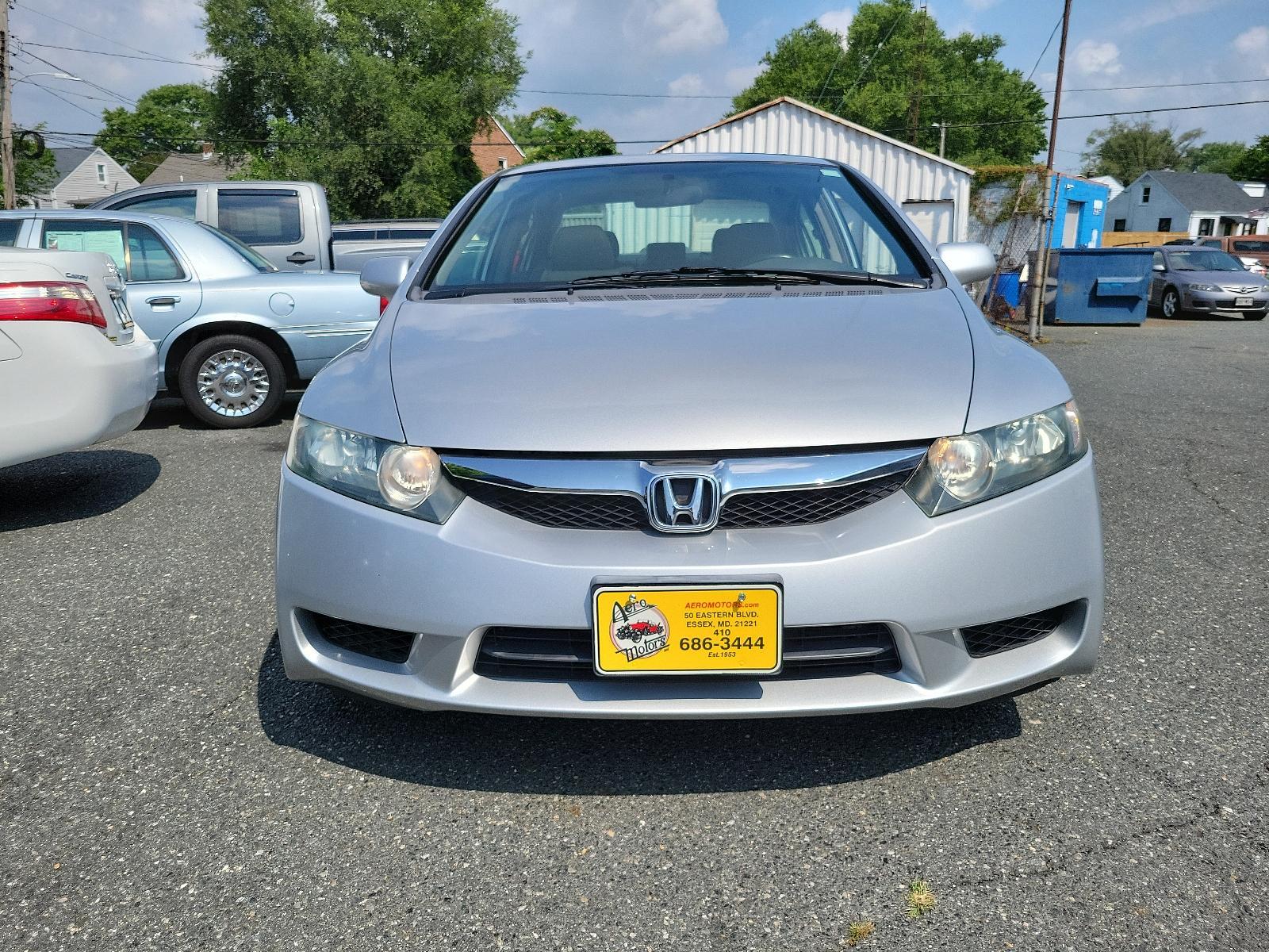 2009 Alabaster Silver Metallic - SI /Gray - GR Honda Civic Sdn EX-L (1HGFA16949L) with an 1.8L SOHC MPFI 16-valve i-VTEC I4 engine engine, located at 50 Eastern Blvd., Essex, MD, 21221, (410) 686-3444, 39.304367, -76.484947 - <p>You'll be impressed with our 2009 Honda Civic EX-L Sedan that stands out in Alabaster Silver Metallic. Powered by a 1.8 Liter 4 Cylinder that offers 140hp paired to a 5 Speed Automatic transmission for zippy acceleration. You will have more than enough power for both around-town and highway drivi - Photo #1