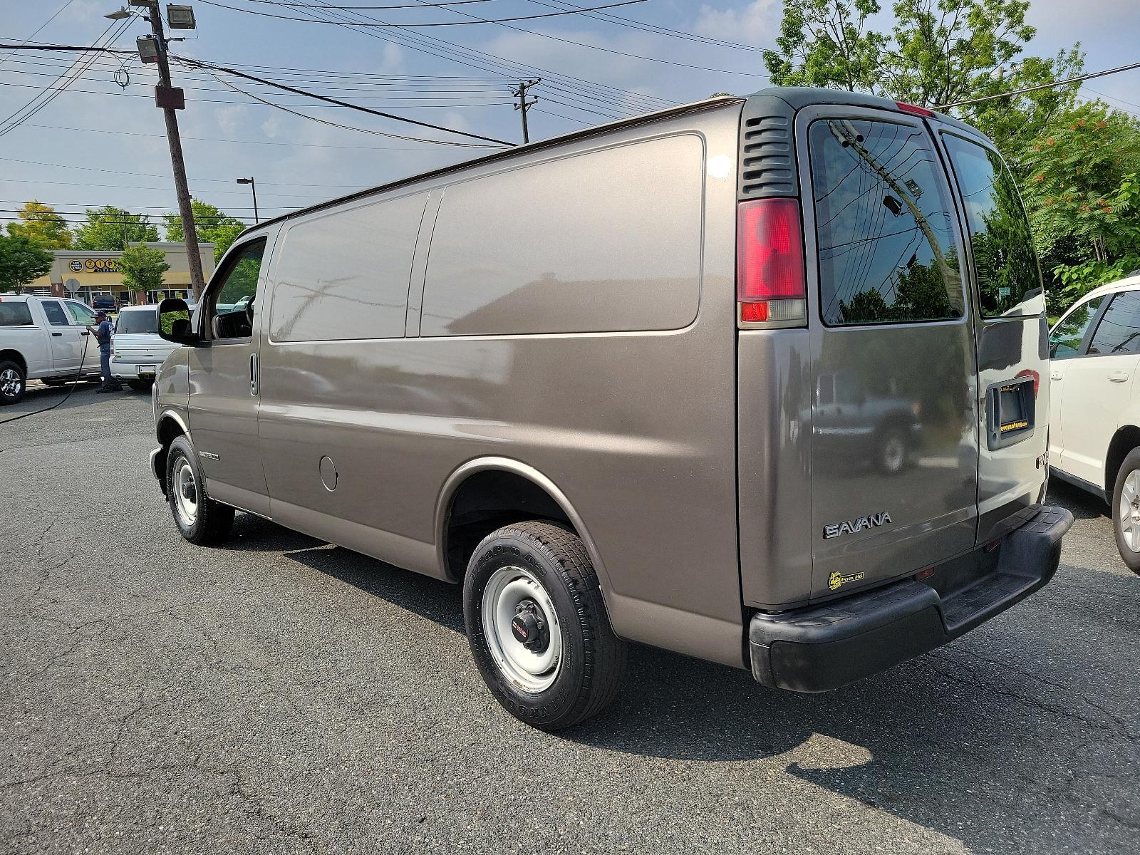 2001 Dark Bronzemist Metallic - 76U /Neutral - 52 GMC Savana Cargo Van (1GTFG25R611) with an 5.7L (350) SFI V8 VORTEC 5700 ENGINE engine, located at 50 Eastern Blvd., Essex, MD, 21221, (410) 686-3444, 39.304367, -76.484947 - <p>Look closely at our 2001 GMC Savana Cargo Van in Dark Bronze Mist Metallic and imagine the possibilities! Powered by a TurboCharged 5.7 Liter V8 that offers 255hp connected to a 4 Speed Automatic transmission. Driving our Rear Wheel Drive van proves to be a workhorse as it returns up to 18mpg on - Photo #5