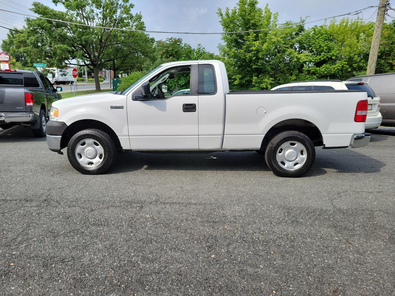 2006 Oxford White - YZ /Flint - E Ford F-150 XL (1FTRF12236N) with an 4.2L EFI V6 ENGINE engine, located at 50 Eastern Blvd., Essex, MD, 21221, (410) 686-3444, 39.304367, -76.484947 - <p>Our great-looking 2006 Ford F-150 XL Regular Cab 4X2 in Oxford White is big, tough, and powerful. Powered by a 4.2 Liter V6 generating 202hp connected to a durable 4 Speed Automatic transmission with Overdrive, this truck is strong enough for any load. This Rear Wheel Drive is ready for anything - Photo #6