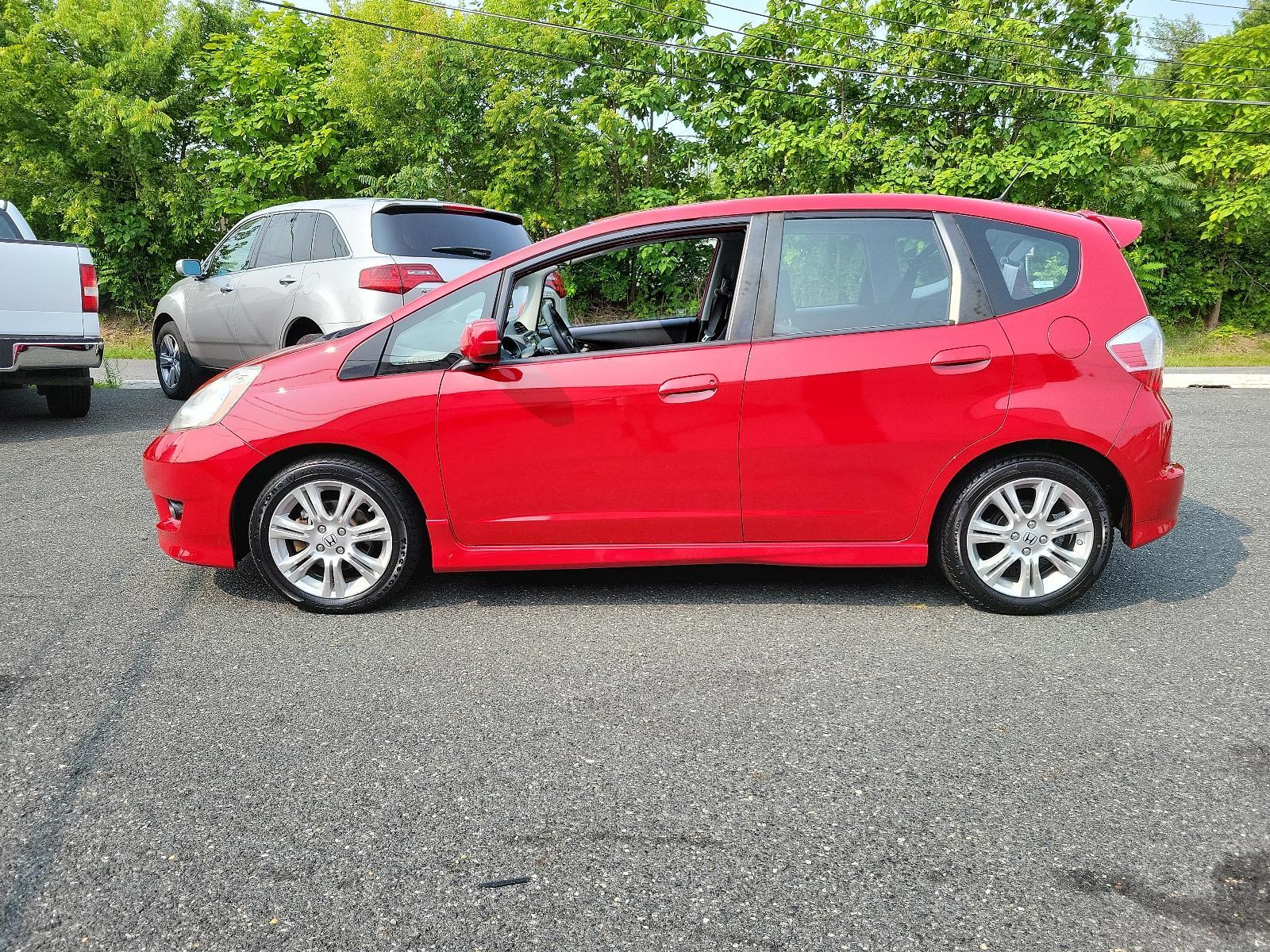 2009 Milano Red - RE /Black - BK Honda Fit Sport w/Navi (JHMGE88629S) with an 1.5L SOHC MPFI 16-valve i-VTEC I4 engine engine, located at 50 Eastern Blvd., Essex, MD, 21221, (410) 686-3444, 39.304367, -76.484947 - <p>Drive in style with our impressive 2009 Honda Fit Sport shown in Milano Red. Powered by an efficient 1.5 Liter 4 Cylinder that offers 117hp and is connected to a 5 Speed Automatic transmission. This Front Wheel Drive is sure to please any driver as it rewards you with nearly 33mpg on the highway. - Photo #6