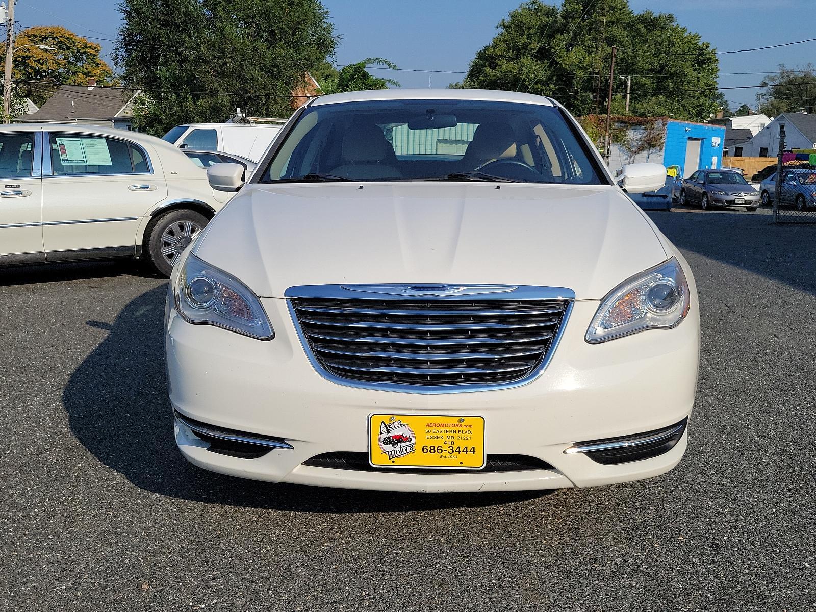 2011 Stone White - PW1 /Black/Light Frost Beige - N7XL Chrysler 200 Touring (1C3BC1FB4BN) with an 2.4L DOHC SMPI 16-VALVE I4 DUAL VVT PZEV ENGINE engine, located at 50 Eastern Blvd., Essex, MD, 21221, (410) 686-3444, 39.304367, -76.484947 - <p>Every road leads to adventure in our 2011 Chrysler 200 Touring Sedan shown in Stone White. Powered by a 2.4 Liter 4 Cylinder that produces 173hp tied to a 6 Speed Automatic transmission for smooth shifting. This Front Wheel Drive Sedan provides plenty of passing power all while reaching up to 31m - Photo #1