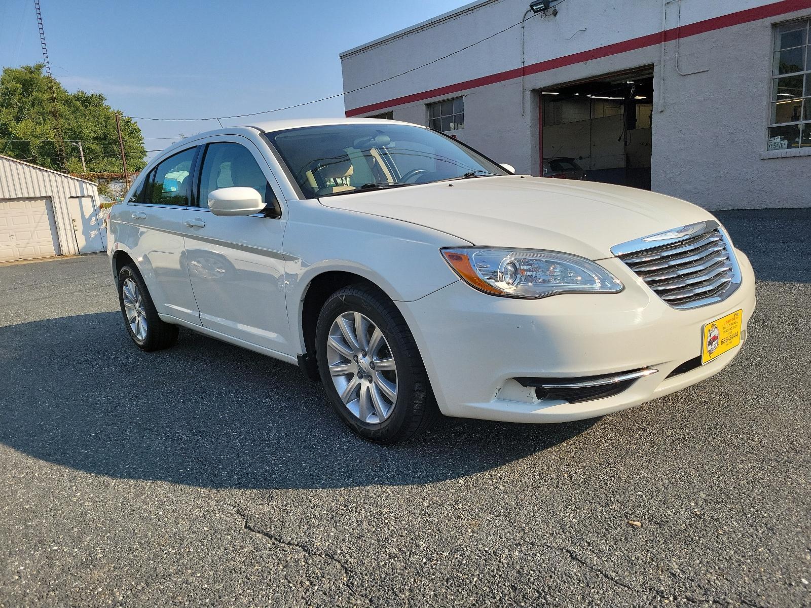 2011 Stone White - PW1 /Black/Light Frost Beige - N7XL Chrysler 200 Touring (1C3BC1FB4BN) with an 2.4L DOHC SMPI 16-VALVE I4 DUAL VVT PZEV ENGINE engine, located at 50 Eastern Blvd., Essex, MD, 21221, (410) 686-3444, 39.304367, -76.484947 - <p>Every road leads to adventure in our 2011 Chrysler 200 Touring Sedan shown in Stone White. Powered by a 2.4 Liter 4 Cylinder that produces 173hp tied to a 6 Speed Automatic transmission for smooth shifting. This Front Wheel Drive Sedan provides plenty of passing power all while reaching up to 31m - Photo #2