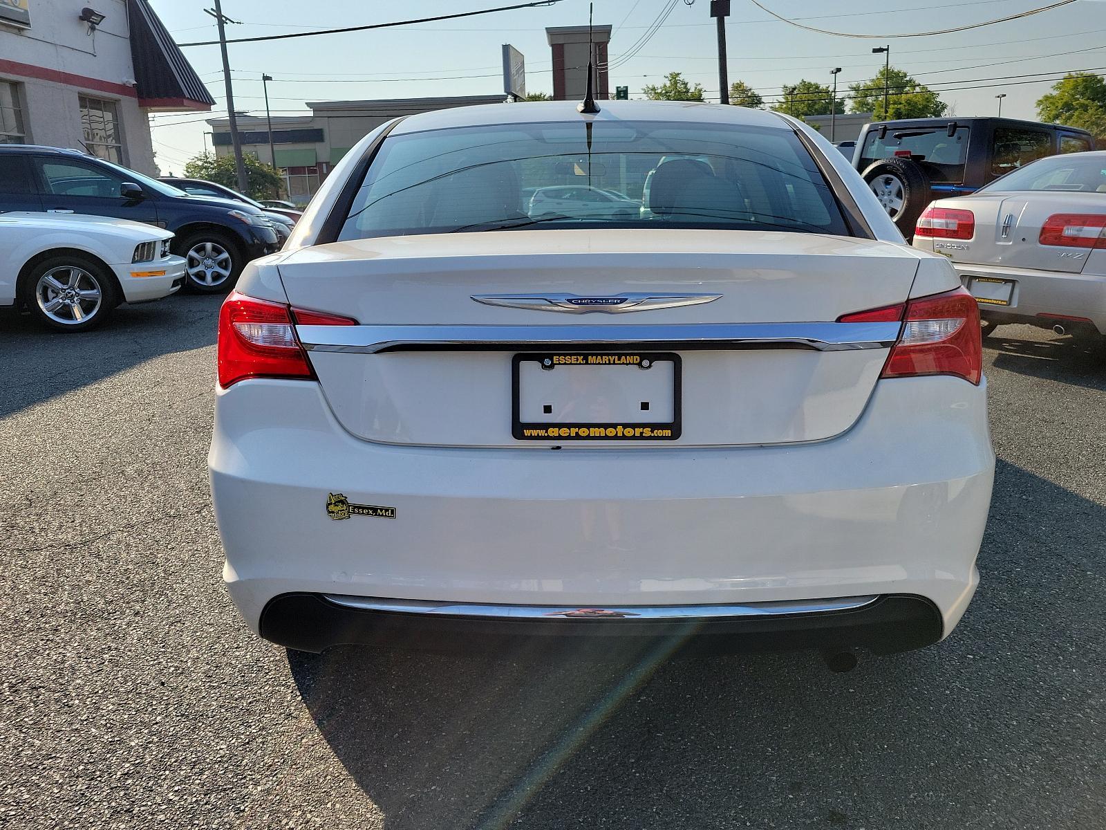 2011 Stone White - PW1 /Black/Light Frost Beige - N7XL Chrysler 200 Touring (1C3BC1FB4BN) with an 2.4L DOHC SMPI 16-VALVE I4 DUAL VVT PZEV ENGINE engine, located at 50 Eastern Blvd., Essex, MD, 21221, (410) 686-3444, 39.304367, -76.484947 - <p>Every road leads to adventure in our 2011 Chrysler 200 Touring Sedan shown in Stone White. Powered by a 2.4 Liter 4 Cylinder that produces 173hp tied to a 6 Speed Automatic transmission for smooth shifting. This Front Wheel Drive Sedan provides plenty of passing power all while reaching up to 31m - Photo #4