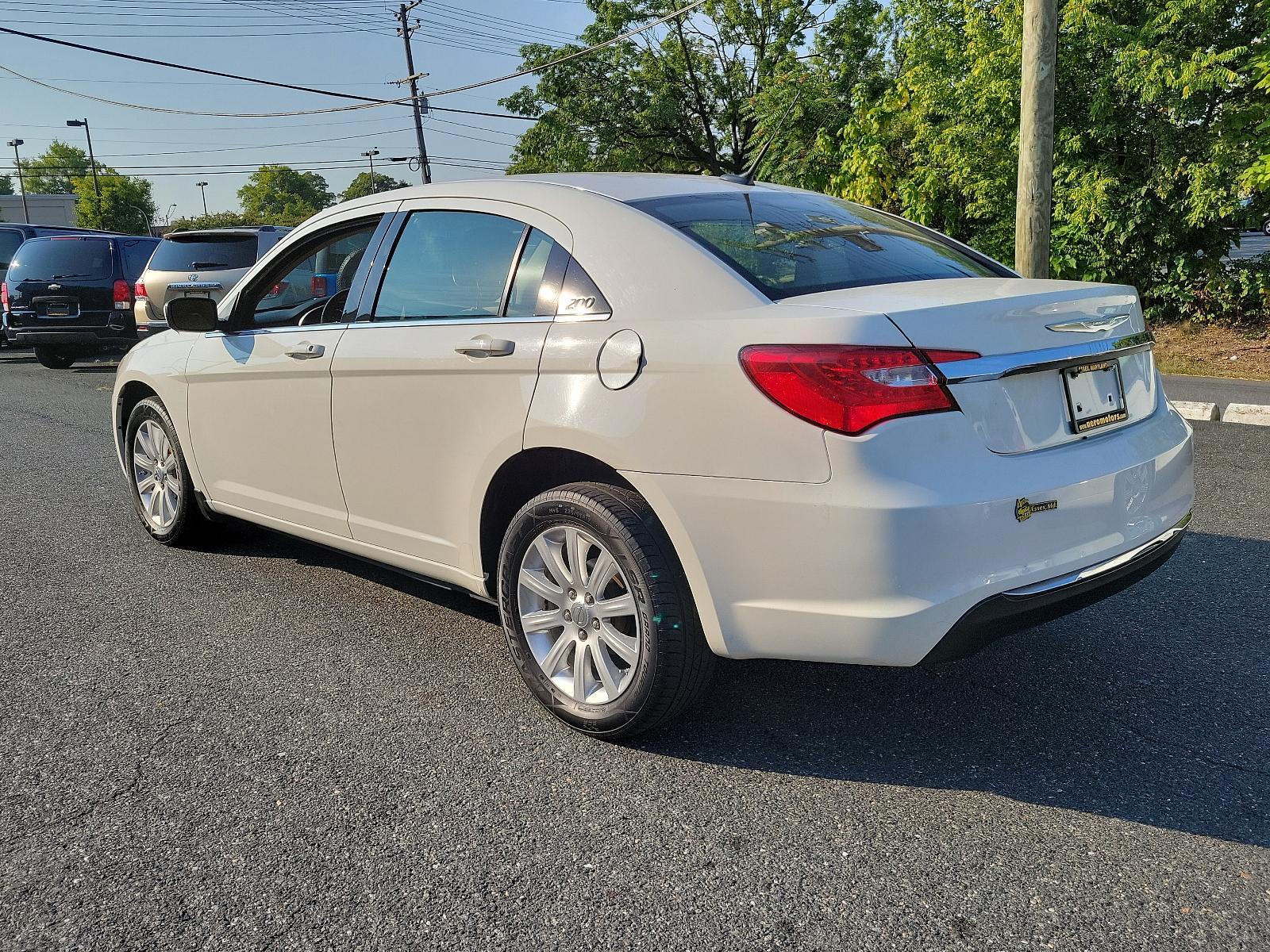 2011 Stone White - PW1 /Black/Light Frost Beige - N7XL Chrysler 200 Touring (1C3BC1FB4BN) with an 2.4L DOHC SMPI 16-VALVE I4 DUAL VVT PZEV ENGINE engine, located at 50 Eastern Blvd., Essex, MD, 21221, (410) 686-3444, 39.304367, -76.484947 - <p>Every road leads to adventure in our 2011 Chrysler 200 Touring Sedan shown in Stone White. Powered by a 2.4 Liter 4 Cylinder that produces 173hp tied to a 6 Speed Automatic transmission for smooth shifting. This Front Wheel Drive Sedan provides plenty of passing power all while reaching up to 31m - Photo #5