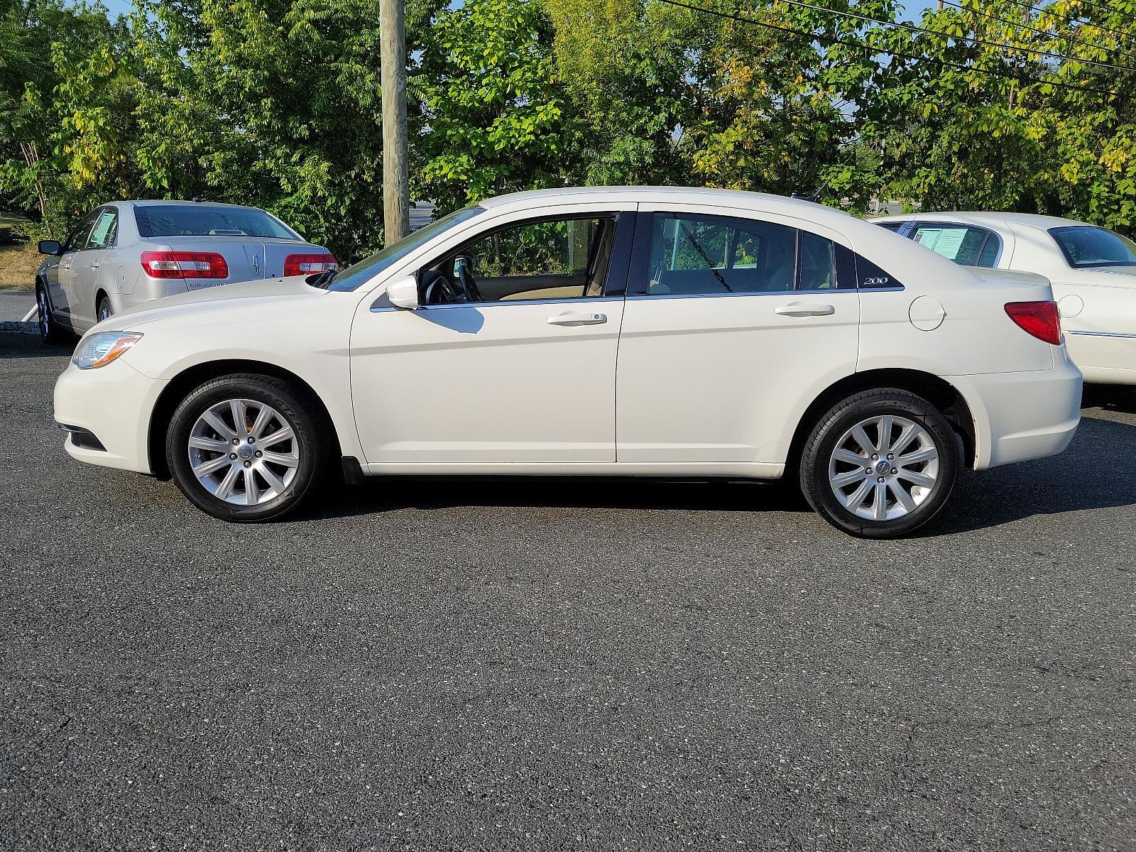 2011 Stone White - PW1 /Black/Light Frost Beige - N7XL Chrysler 200 Touring (1C3BC1FB4BN) with an 2.4L DOHC SMPI 16-VALVE I4 DUAL VVT PZEV ENGINE engine, located at 50 Eastern Blvd., Essex, MD, 21221, (410) 686-3444, 39.304367, -76.484947 - <p>Every road leads to adventure in our 2011 Chrysler 200 Touring Sedan shown in Stone White. Powered by a 2.4 Liter 4 Cylinder that produces 173hp tied to a 6 Speed Automatic transmission for smooth shifting. This Front Wheel Drive Sedan provides plenty of passing power all while reaching up to 31m - Photo #6