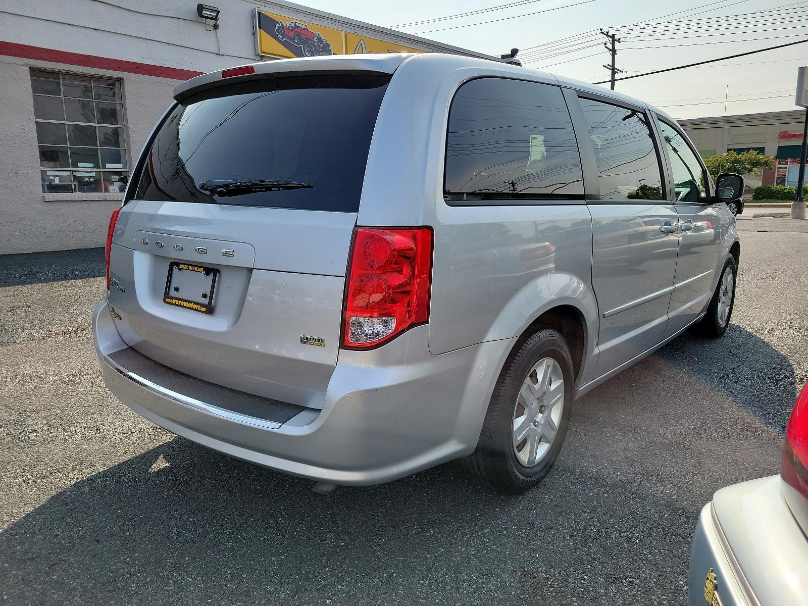 2011 Bright Silver Metallic - PS2 /Black/Light Graystone Interior - H7X1 Dodge Grand Caravan Express (2D4RN4DG0BR) with an 3.6L VVT 24-VALVE V6 ENGINE engine, located at 50 Eastern Blvd., Essex, MD, 21221, (410) 686-3444, 39.304367, -76.484947 - <p>This 2011 Dodge Grand Caravan Express shown off in Bright Silver Metallic is the perfect side-kick for you! Powered by a 3.6 Liter V6 generating 283hp while connected to the 6 Speed Automatic transmission for a smooth ride you are sure to enjoy. One trip around the block in our Front Wheel Drive - Photo #3