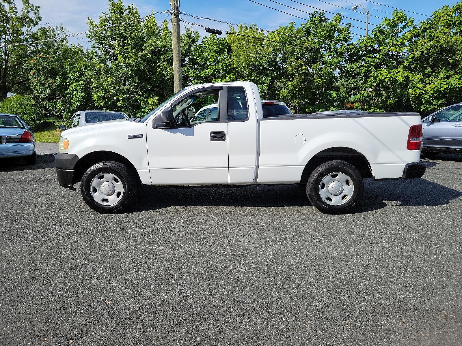 2007 Oxford White - YZ /Flint - E Ford F-150 XL (1FTRF12267K) with an 4.2L EFI V6 ENGINE engine, located at 50 Eastern Blvd., Essex, MD, 21221, (410) 686-3444, 39.304367, -76.484947 - <p>Our 2007 Ford F-150 XL Regular Cab 4X2 is a great truck for mixing work and play in Dark Blue Pearl. Powered by a 4.2 Liter V6 generating 202hp while connected to the 4 Speed Automatic transmission for optimal performance. Once you're behind the wheel of this Rear Wheel Drive F-150, enjoy earning - Photo #6