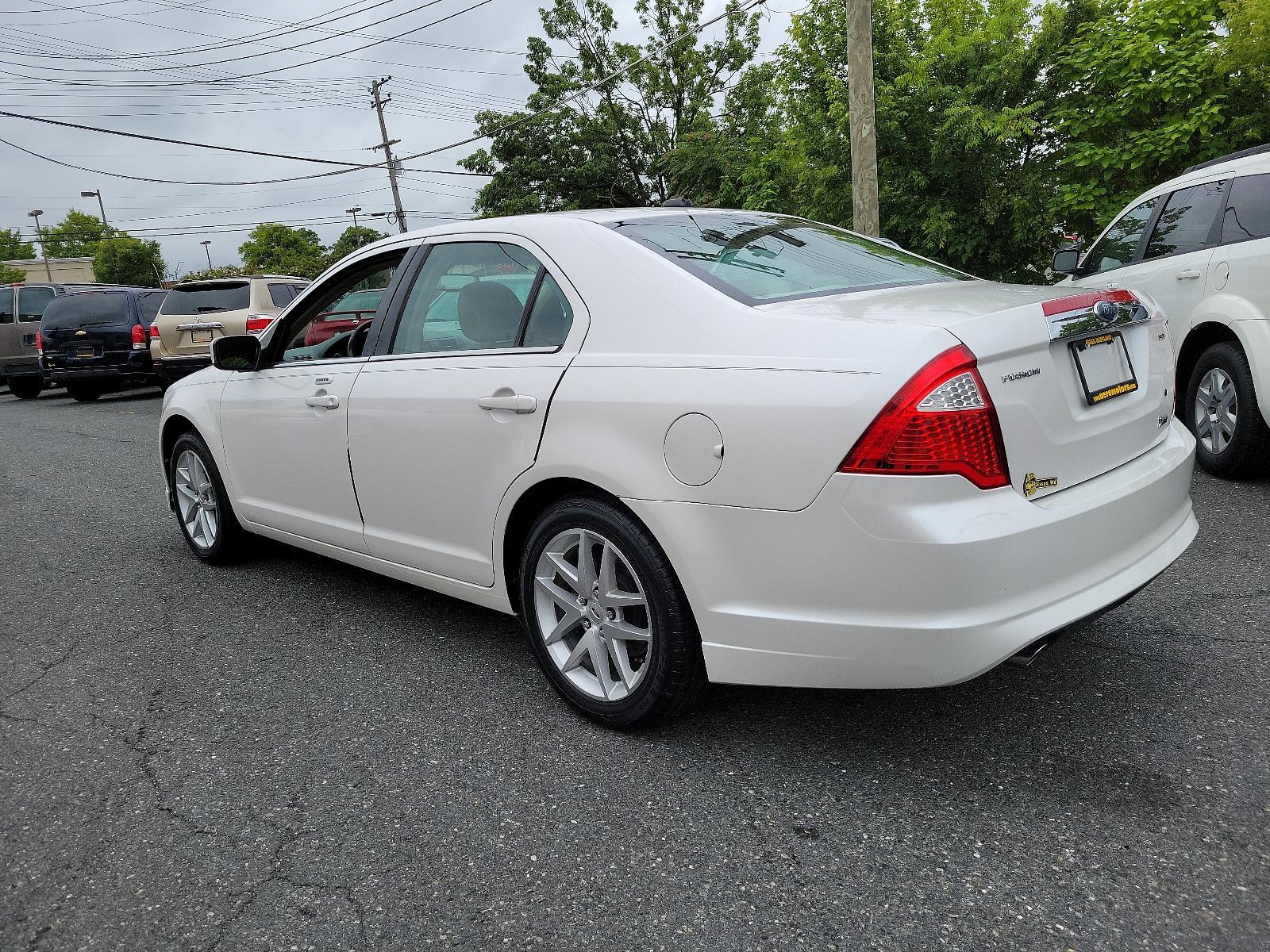 2010 White Platinum Metallic Tri-Coat - UG /Medium Light Stone - DL Ford Fusion SEL (3FAHP0JG8AR) with an 3.0L 24V V6 DURATEC FLEX FUEL ENGINE engine, located at 50 Eastern Blvd., Essex, MD, 21221, (410) 686-3444, 39.304367, -76.484947 - <p>Our great looking 2010 Ford Fusion SEL Sedan in White Platinum Metallic offers fuel efficiency, a spacious cabin, ride comfort, and great handling. Powered by a 3.0 Liter V6 that generates an impressive 240hp paired with a responsive 6 Speed Automatic transmission. This Front Wheel Drive is incre - Photo #5