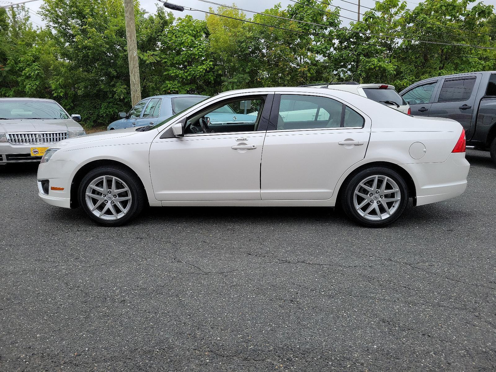 2010 White Platinum Metallic Tri-Coat - UG /Medium Light Stone - DL Ford Fusion SEL (3FAHP0JG8AR) with an 3.0L 24V V6 DURATEC FLEX FUEL ENGINE engine, located at 50 Eastern Blvd., Essex, MD, 21221, (410) 686-3444, 39.304367, -76.484947 - <p>Our great looking 2010 Ford Fusion SEL Sedan in White Platinum Metallic offers fuel efficiency, a spacious cabin, ride comfort, and great handling. Powered by a 3.0 Liter V6 that generates an impressive 240hp paired with a responsive 6 Speed Automatic transmission. This Front Wheel Drive is incre - Photo #6
