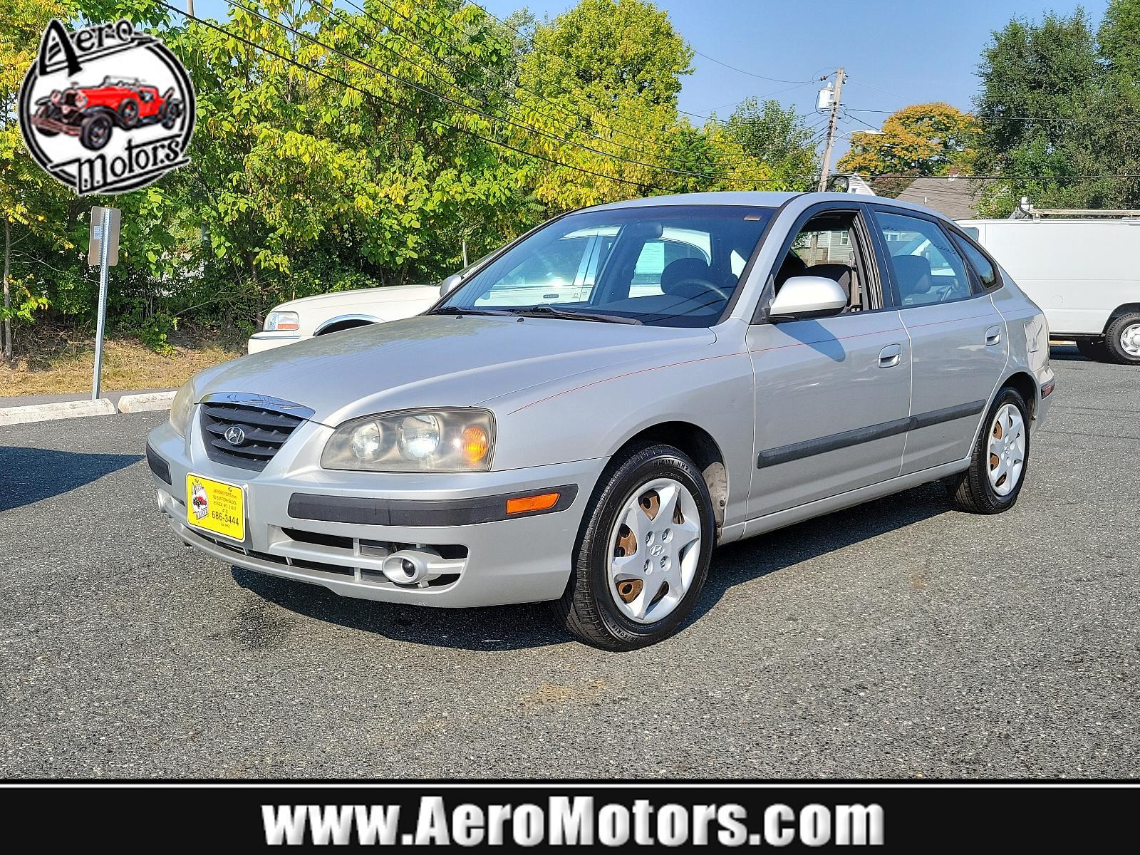 2006 Sterling Silver Metallic - TW /Gray - LT Hyundai Elantra GLS (KMHDN56D56U) with an 2.0L DOHC MPI 16-valve I4 engine w/continuously variable valve timing (CVVT) engine, located at 50 Eastern Blvd., Essex, MD, 21221, (410) 686-3444, 39.304367, -76.484947 - <p>Our 2006 Hyundai Elantra GLS Sedan presented in Sterling Silver Metallic boasts comfort and style. Powered by an efficient 2.0 Liter 4 Cylinder that offers plenty of power connected to a 5 Speed Automatic transmission. Our Front Wheel Drive sedan boasts nearly 36mpg on the open road and turns hea - Photo #0