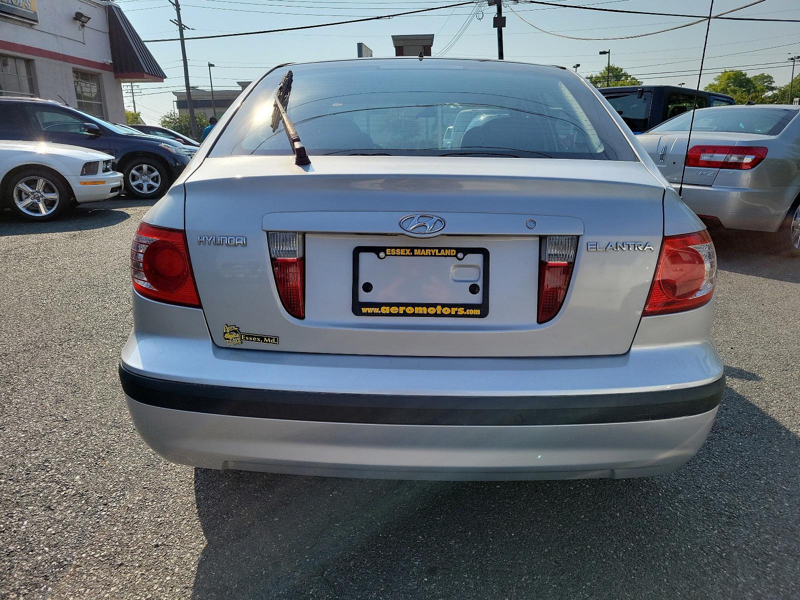 2006 Sterling Silver Metallic - TW /Gray - LT Hyundai Elantra GLS (KMHDN56D56U) with an 2.0L DOHC MPI 16-valve I4 engine w/continuously variable valve timing (CVVT) engine, located at 50 Eastern Blvd., Essex, MD, 21221, (410) 686-3444, 39.304367, -76.484947 - <p>Our 2006 Hyundai Elantra GLS Sedan presented in Sterling Silver Metallic boasts comfort and style. Powered by an efficient 2.0 Liter 4 Cylinder that offers plenty of power connected to a 5 Speed Automatic transmission. Our Front Wheel Drive sedan boasts nearly 36mpg on the open road and turns hea - Photo #4