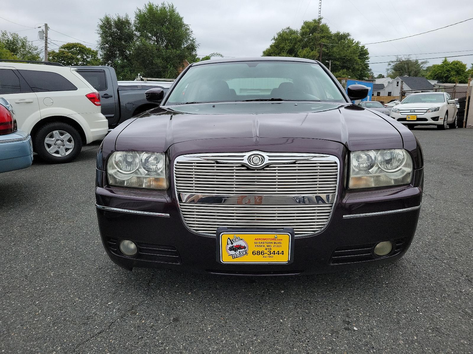 2005 Deep Lava Red Pearl - PMQ /Drk/M Slate Gray - DD Chrysler 300 300 Touring (2C3JA53G75H) with an 3.5L MPI 24-VALVE HO V6 ENGINE engine, located at 50 Eastern Blvd., Essex, MD, 21221, (410) 686-3444, 39.304367, -76.484947 - <p>Our 2005 Chrysler 300 Touring Sedan offers an incredible driving experience while shining bright in Deep Lava Red Pearl. Powered by a 3.5 Liter V6 that produces 250hp connected to a 4 Speed Automatic transmission. This Rear Wheel Drive drives well, earning nearly 25mpg on the highway.</p><p><br>< - Photo #1