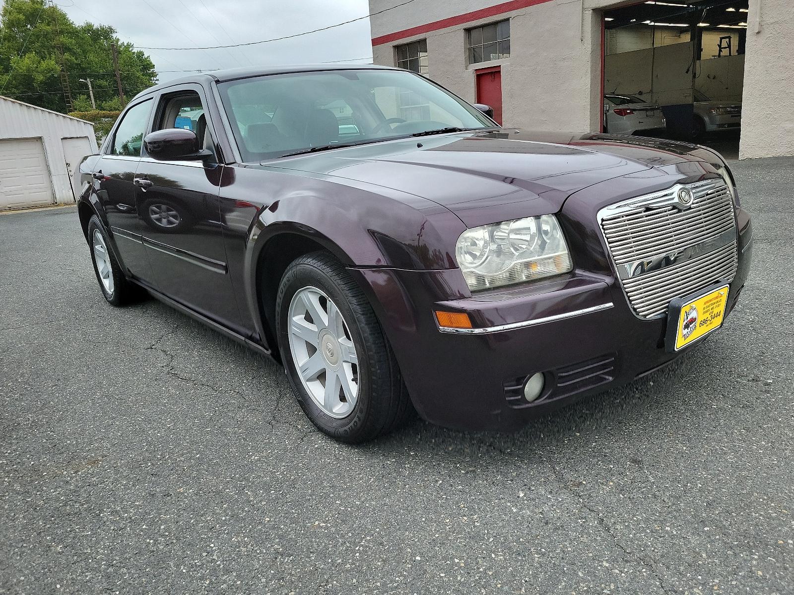 2005 Deep Lava Red Pearl - PMQ /Drk/M Slate Gray - DD Chrysler 300 300 Touring (2C3JA53G75H) with an 3.5L MPI 24-VALVE HO V6 ENGINE engine, located at 50 Eastern Blvd., Essex, MD, 21221, (410) 686-3444, 39.304367, -76.484947 - <p>Our 2005 Chrysler 300 Touring Sedan offers an incredible driving experience while shining bright in Deep Lava Red Pearl. Powered by a 3.5 Liter V6 that produces 250hp connected to a 4 Speed Automatic transmission. This Rear Wheel Drive drives well, earning nearly 25mpg on the highway.</p><p><br>< - Photo #2