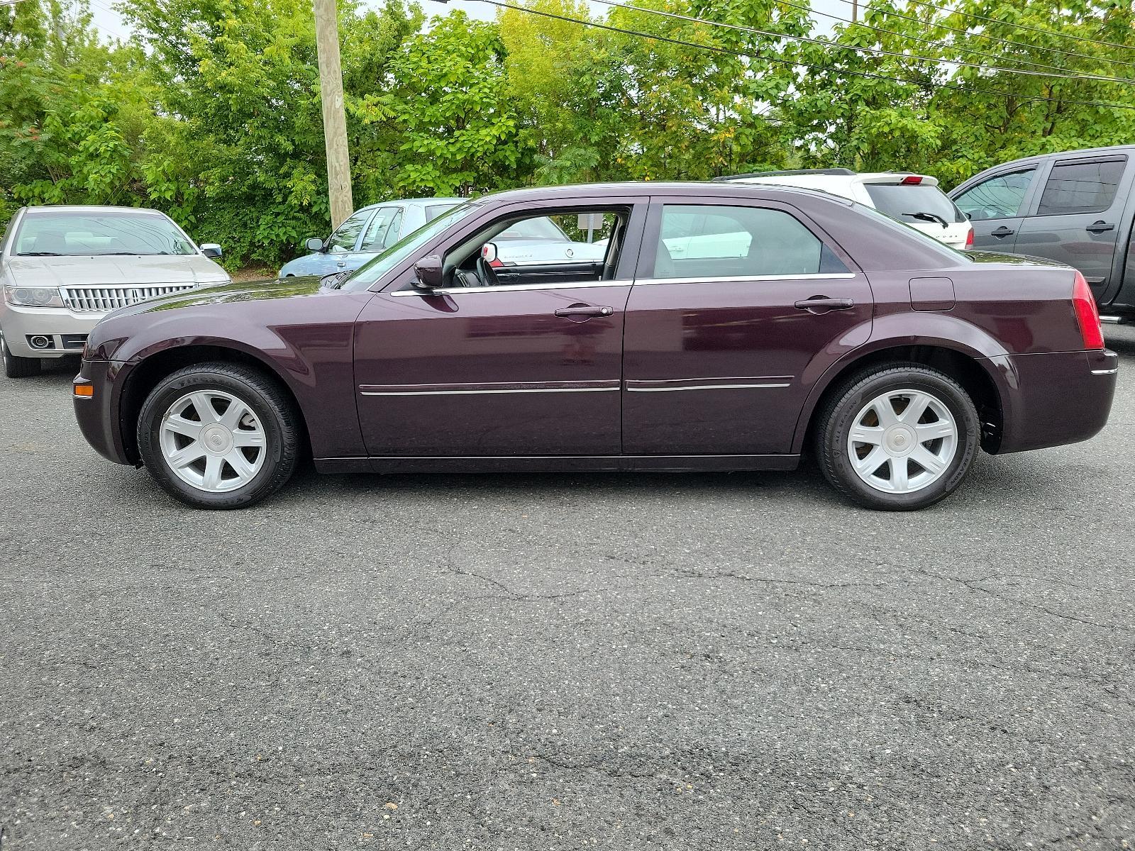 2005 Deep Lava Red Pearl - PMQ /Drk/M Slate Gray - DD Chrysler 300 300 Touring (2C3JA53G75H) with an 3.5L MPI 24-VALVE HO V6 ENGINE engine, located at 50 Eastern Blvd., Essex, MD, 21221, (410) 686-3444, 39.304367, -76.484947 - <p>Our 2005 Chrysler 300 Touring Sedan offers an incredible driving experience while shining bright in Deep Lava Red Pearl. Powered by a 3.5 Liter V6 that produces 250hp connected to a 4 Speed Automatic transmission. This Rear Wheel Drive drives well, earning nearly 25mpg on the highway.</p><p><br>< - Photo #6