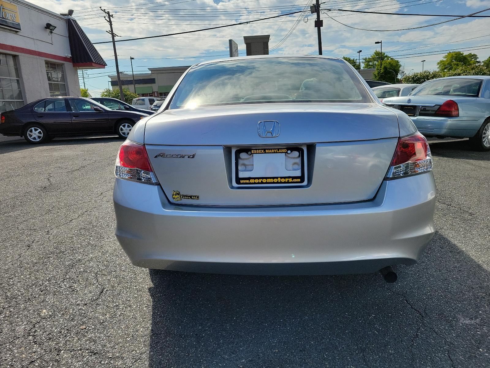 2009 Alabaster Silver Metallic - SI /Gray - GR Honda Accord Sdn LX (1HGCP26399A) with an 2.4L DOHC MPFI 16-valve i-VTEC I4 engine engine, located at 50 Eastern Blvd., Essex, MD, 21221, (410) 686-3444, 39.304367, -76.484947 - <p>Synonymous with value, efficiency, and reliability, our 2009 Honda Accord LX Sedan in Basque Red Pearl is a superb choice to take you from point A to point B in style! The 2.4 Liter 4 Cylinder offering 177hp while paired to a 5 Speed Automatic transmission provides a quiet, refined ride with exce - Photo #4