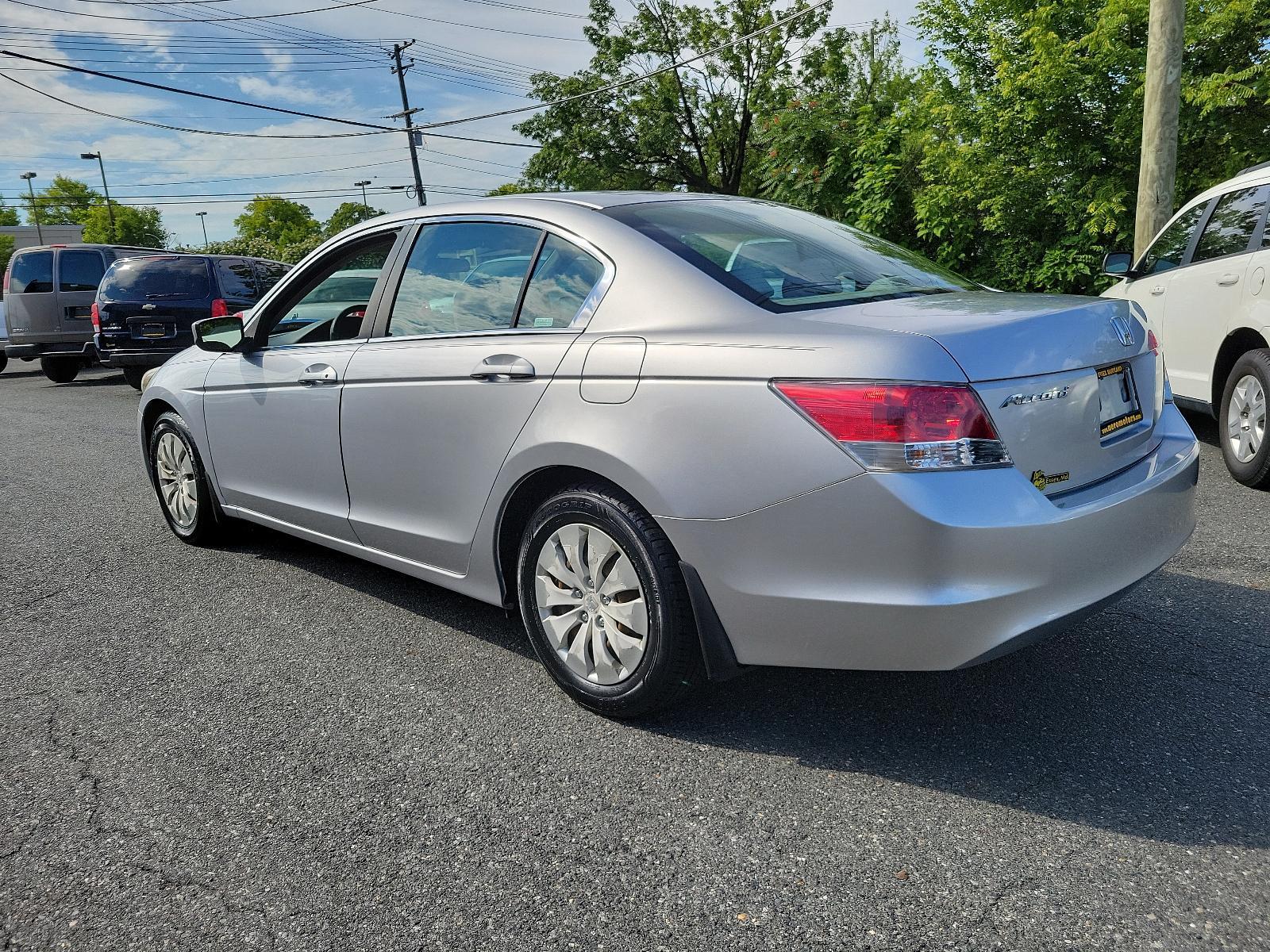 2009 Alabaster Silver Metallic - SI /Gray - GR Honda Accord Sdn LX (1HGCP26399A) with an 2.4L DOHC MPFI 16-valve i-VTEC I4 engine engine, located at 50 Eastern Blvd., Essex, MD, 21221, (410) 686-3444, 39.304367, -76.484947 - <p>Synonymous with value, efficiency, and reliability, our 2009 Honda Accord LX Sedan in Basque Red Pearl is a superb choice to take you from point A to point B in style! The 2.4 Liter 4 Cylinder offering 177hp while paired to a 5 Speed Automatic transmission provides a quiet, refined ride with exce - Photo #5