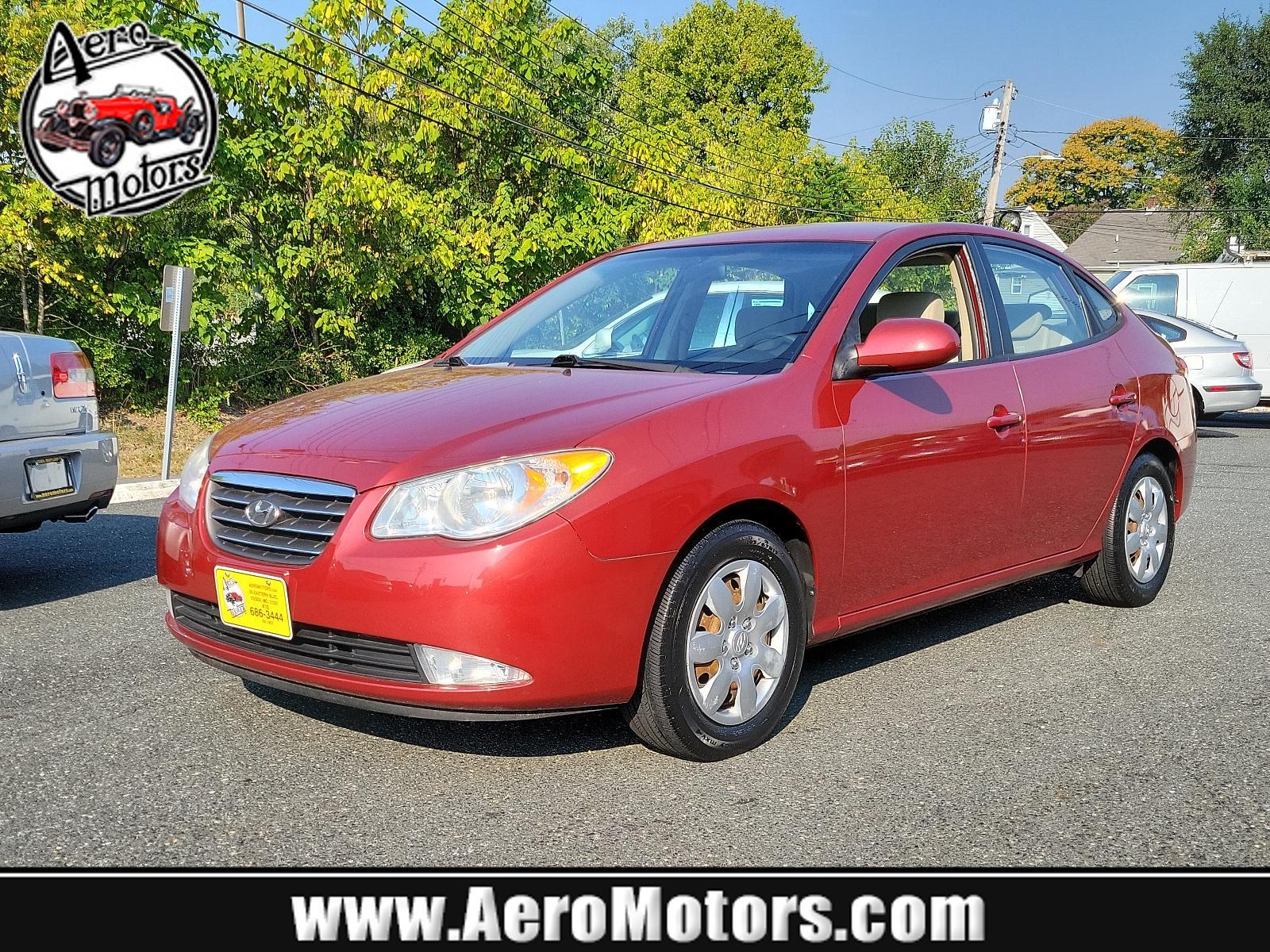 2008 Apple Red Pearl - ND /Beige - 9K Hyundai Elantra GLS (KMHDU46D48U) with an 2.0L DOHC CVVT 16-valve I4 engine engine, located at 50 Eastern Blvd., Essex, MD, 21221, (410) 686-3444, 39.304367, -76.484947 - <p>Attractive and purposeful, our 2008 Hyundai Elantra GLS Sedan is an excellent choice in Laguna Sand! Powered by a 2.0 Liter Inline 4 Cylinder producing 138hp while connected to a 4 Speed Automatic transmission. This Front Wheel Drive Sedan earns near 33mpg on the highway and delivers just what yo - Photo #0