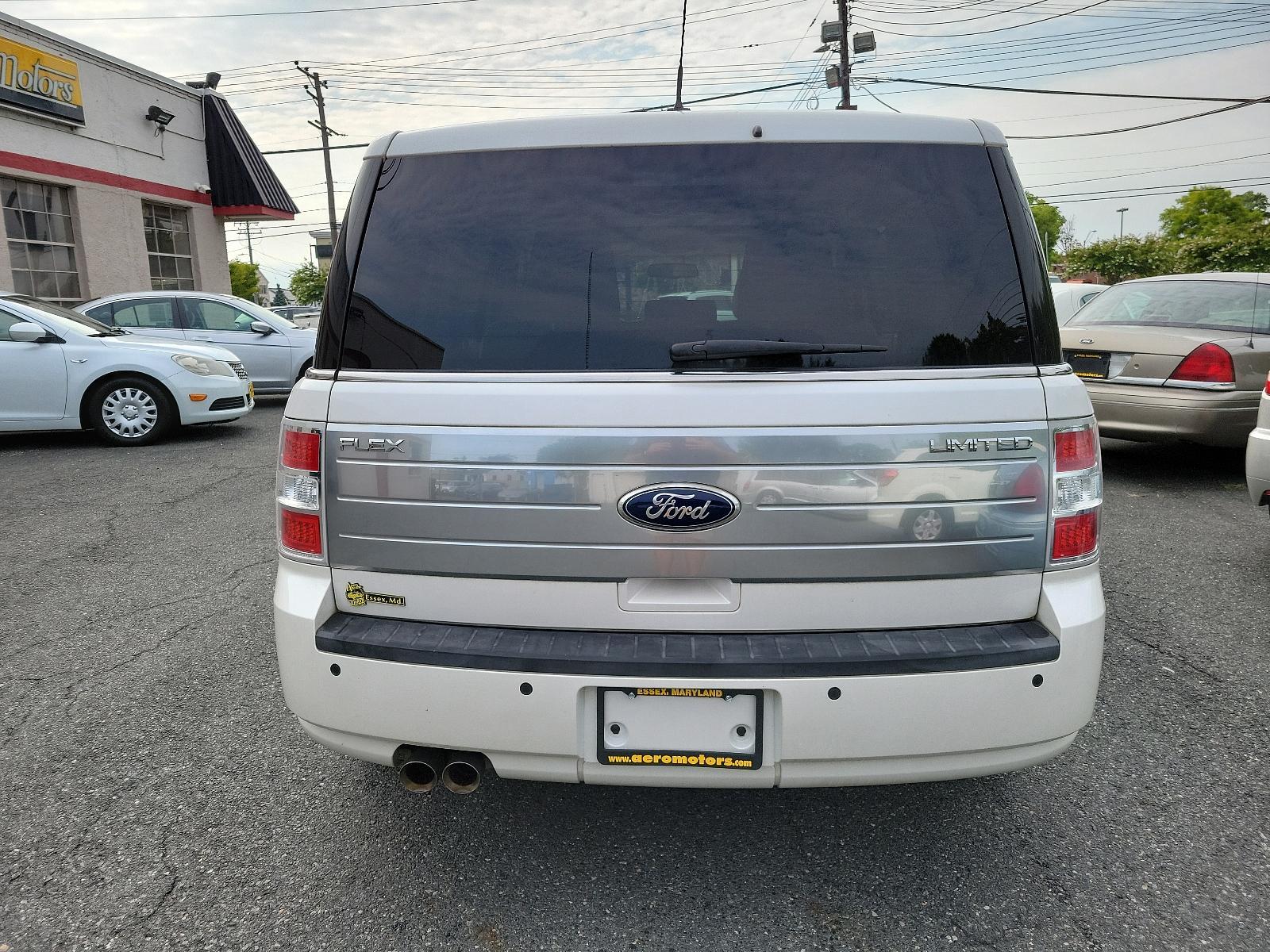 2012 White Platinum Metallic Tri-Coat - UG /Medium Light Stone - PS Ford Flex Limited (2FMGK5DC7CB) with an 3.5L V6 DURATEC ENGINE engine, located at 50 Eastern Blvd., Essex, MD, 21221, (410) 686-3444, 39.304367, -76.484947 - <p>Our versatile 2012 Ford Flex Limited looks sharp in White Platinum Tri-coat. Powered by a 3.5 Liter Duratec V6 offering 285hp paired with a 6 Speed Selectshift Automatic transmission. This Front Wheel Drive SUV offers near 25mpg on the highway while the independent suspension offers a smooth ride - Photo #4