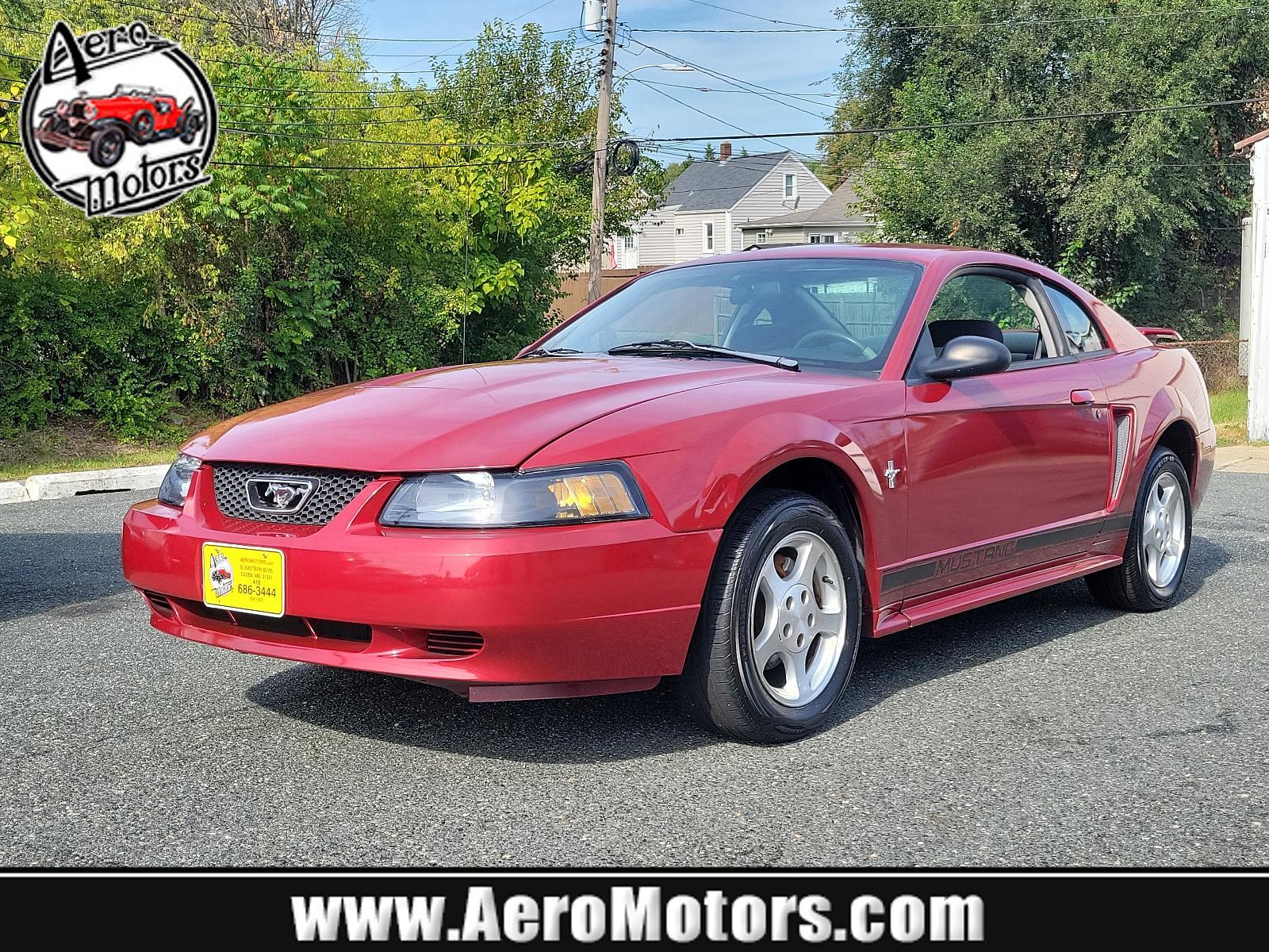 2003 Redfire Metallic - G2 /Dark Charcoal - W Ford Mustang Standard (1FAFP40473F) with an 3.8L SMPI V6 ENGINE engine, located at 50 Eastern Blvd., Essex, MD, 21221, (410) 686-3444, 39.304367, -76.484947 - Photo #0
