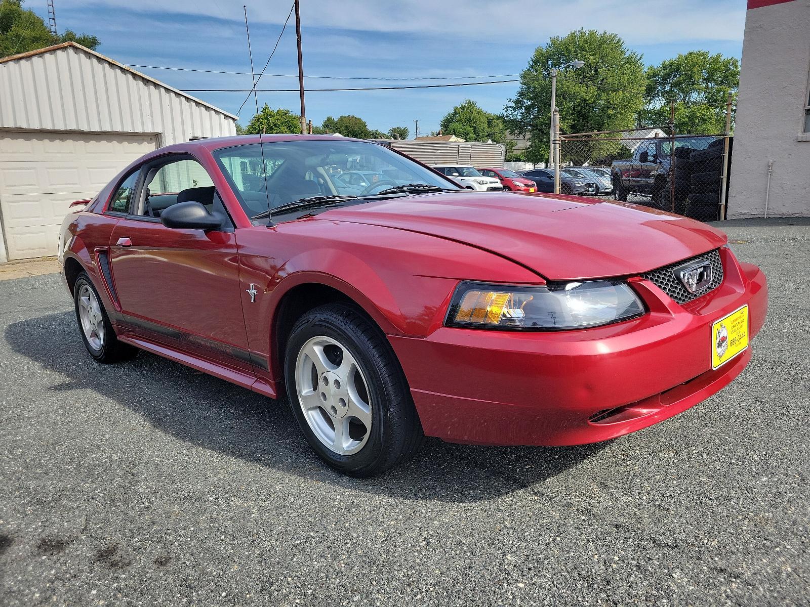 2003 Redfire Metallic - G2 /Dark Charcoal - W Ford Mustang Standard (1FAFP40473F) with an 3.8L SMPI V6 ENGINE engine, located at 50 Eastern Blvd., Essex, MD, 21221, (410) 686-3444, 39.304367, -76.484947 - Photo #2