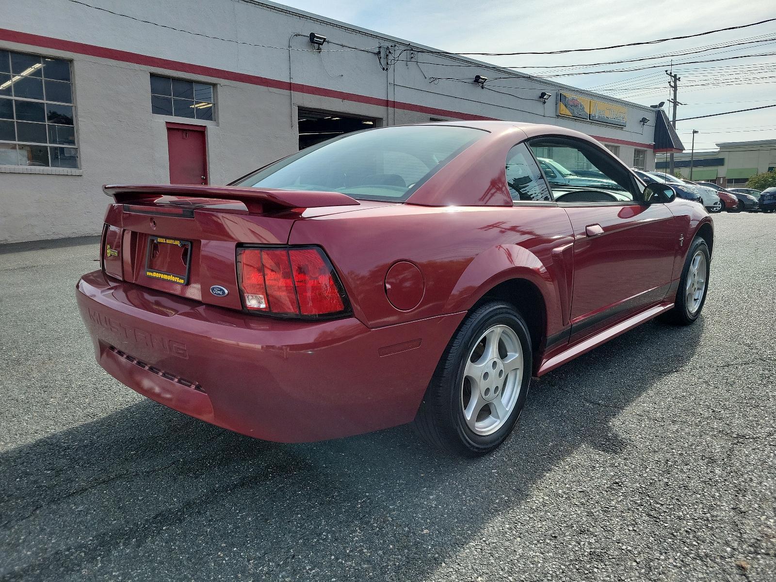 2003 Redfire Metallic - G2 /Dark Charcoal - W Ford Mustang Standard (1FAFP40473F) with an 3.8L SMPI V6 ENGINE engine, located at 50 Eastern Blvd., Essex, MD, 21221, (410) 686-3444, 39.304367, -76.484947 - Photo #3
