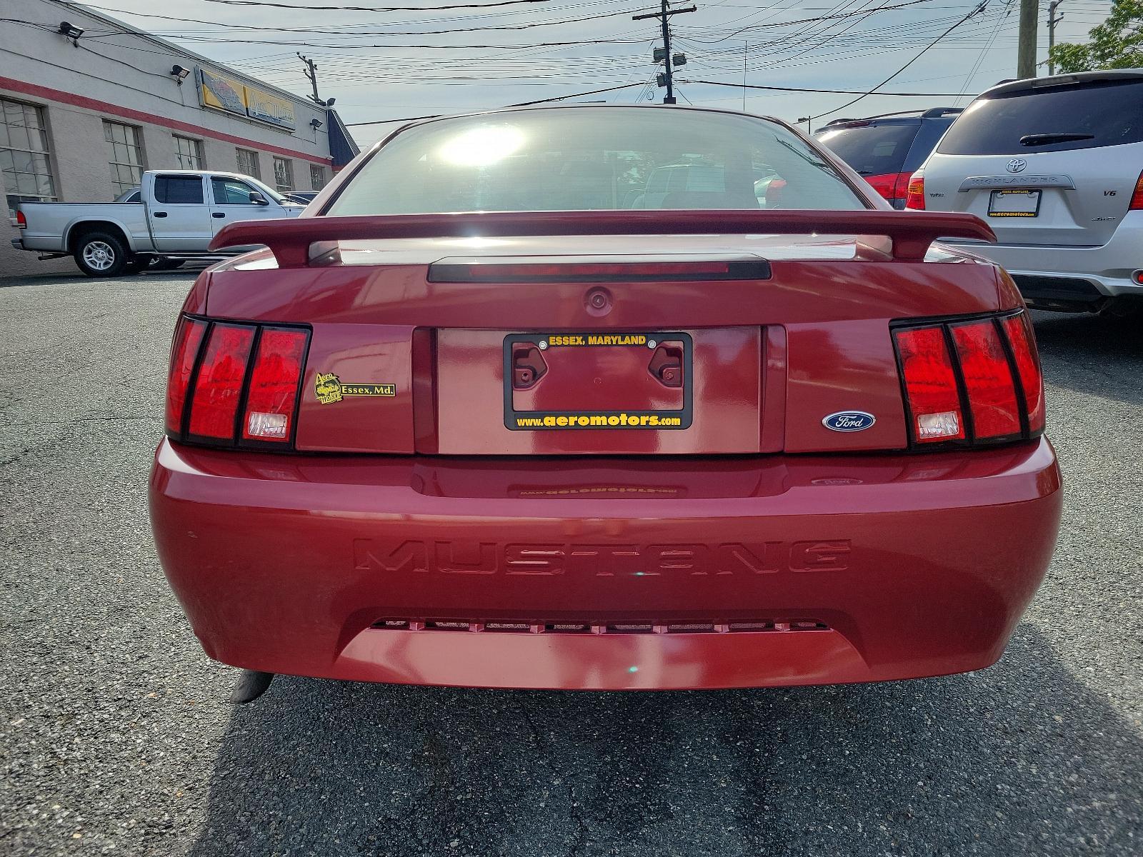 2003 Redfire Metallic - G2 /Dark Charcoal - W Ford Mustang Standard (1FAFP40473F) with an 3.8L SMPI V6 ENGINE engine, located at 50 Eastern Blvd., Essex, MD, 21221, (410) 686-3444, 39.304367, -76.484947 - Photo #4