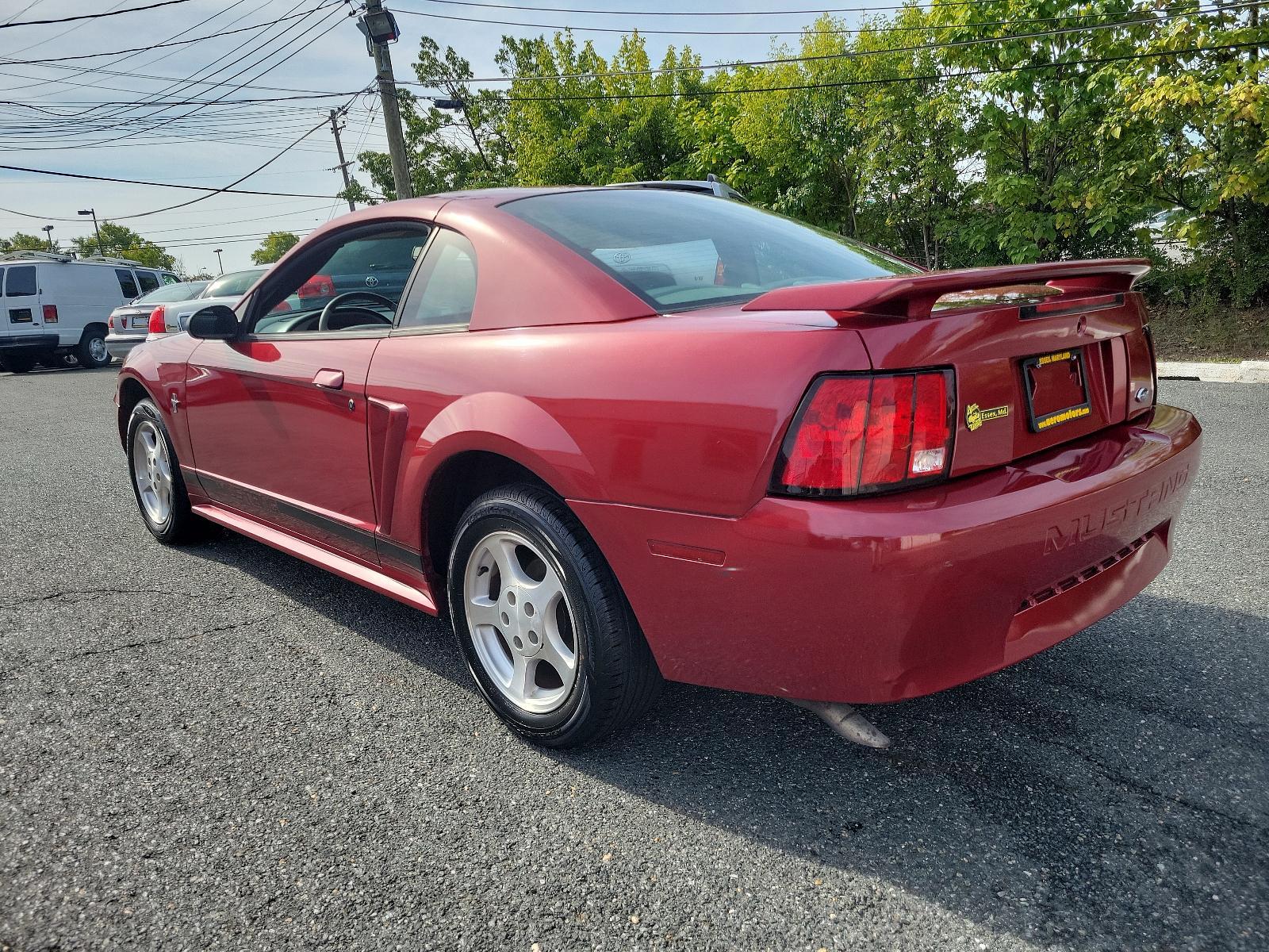 2003 Redfire Metallic - G2 /Dark Charcoal - W Ford Mustang Standard (1FAFP40473F) with an 3.8L SMPI V6 ENGINE engine, located at 50 Eastern Blvd., Essex, MD, 21221, (410) 686-3444, 39.304367, -76.484947 - Photo #5
