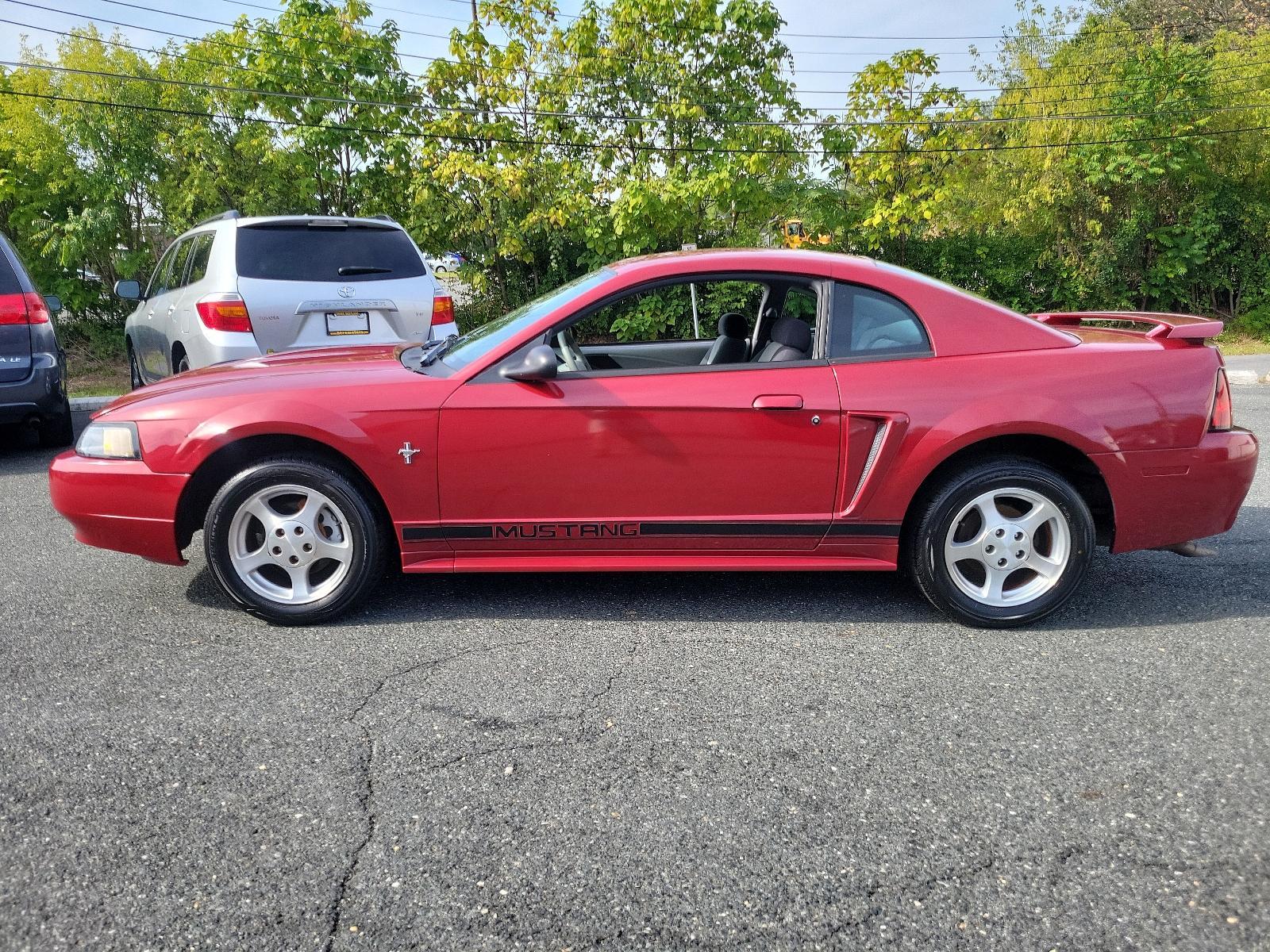 2003 Redfire Metallic - G2 /Dark Charcoal - W Ford Mustang Standard (1FAFP40473F) with an 3.8L SMPI V6 ENGINE engine, located at 50 Eastern Blvd., Essex, MD, 21221, (410) 686-3444, 39.304367, -76.484947 - Photo #6