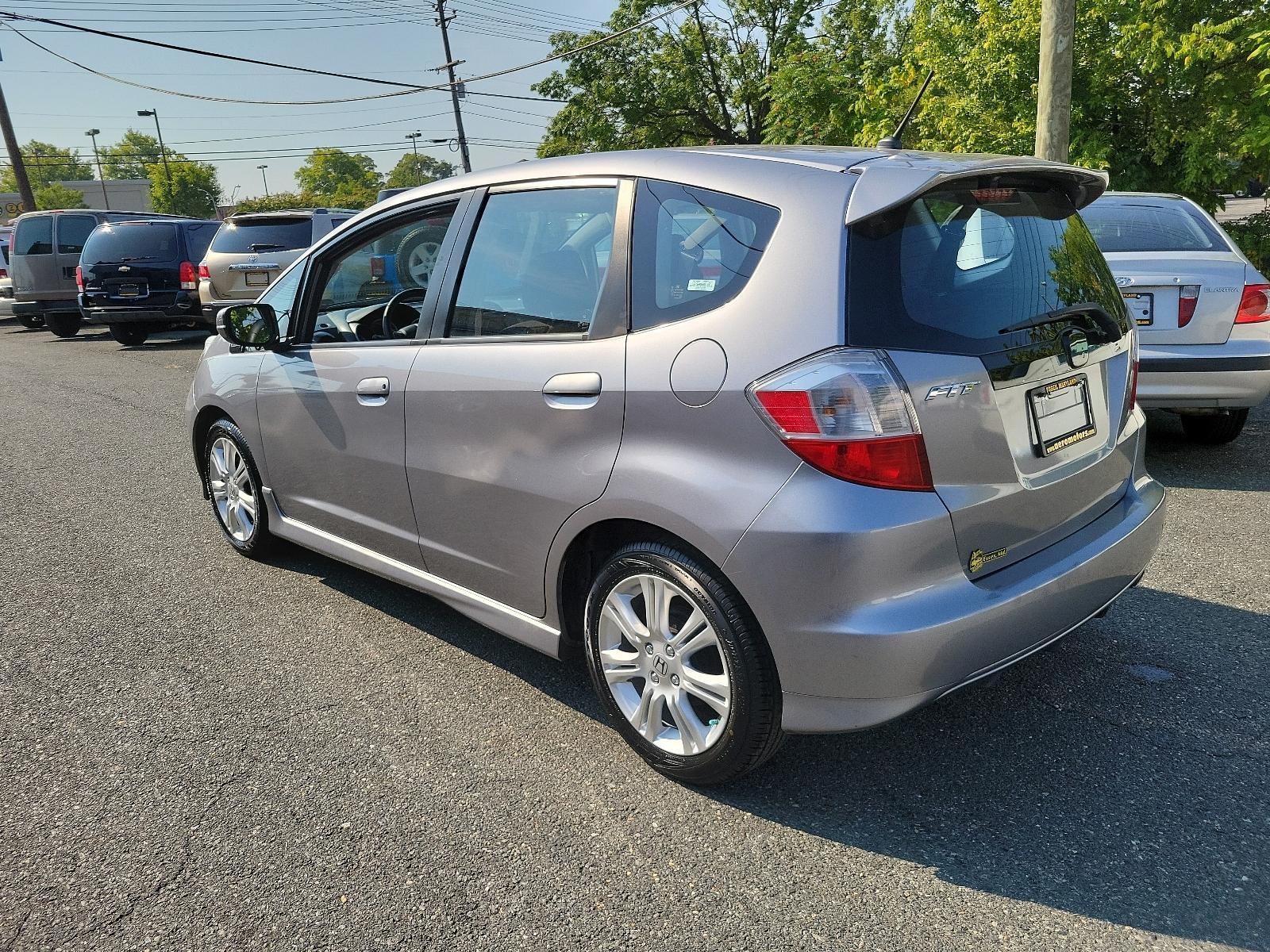 2009 Storm Silver Metallic - SI /Black - BK Honda Fit Sport w/Navi (JHMGE87689S) with an 1.5L SOHC MPFI 16-valve i-VTEC I4 engine engine, located at 50 Eastern Blvd., Essex, MD, 21221, (410) 686-3444, 39.304367, -76.484947 - <p>Check out this lively 2009 Honda Fit Sport on display in Storm Silve Metallic! Powered by an energetic 1.5 Liter 4 Cylinder offering 117hp while paired to a 5 Speed Manual transmission. This Front Wheel Drive combination will reward you with nearly 33mpg on the highway! It's not often you find a - Photo #5