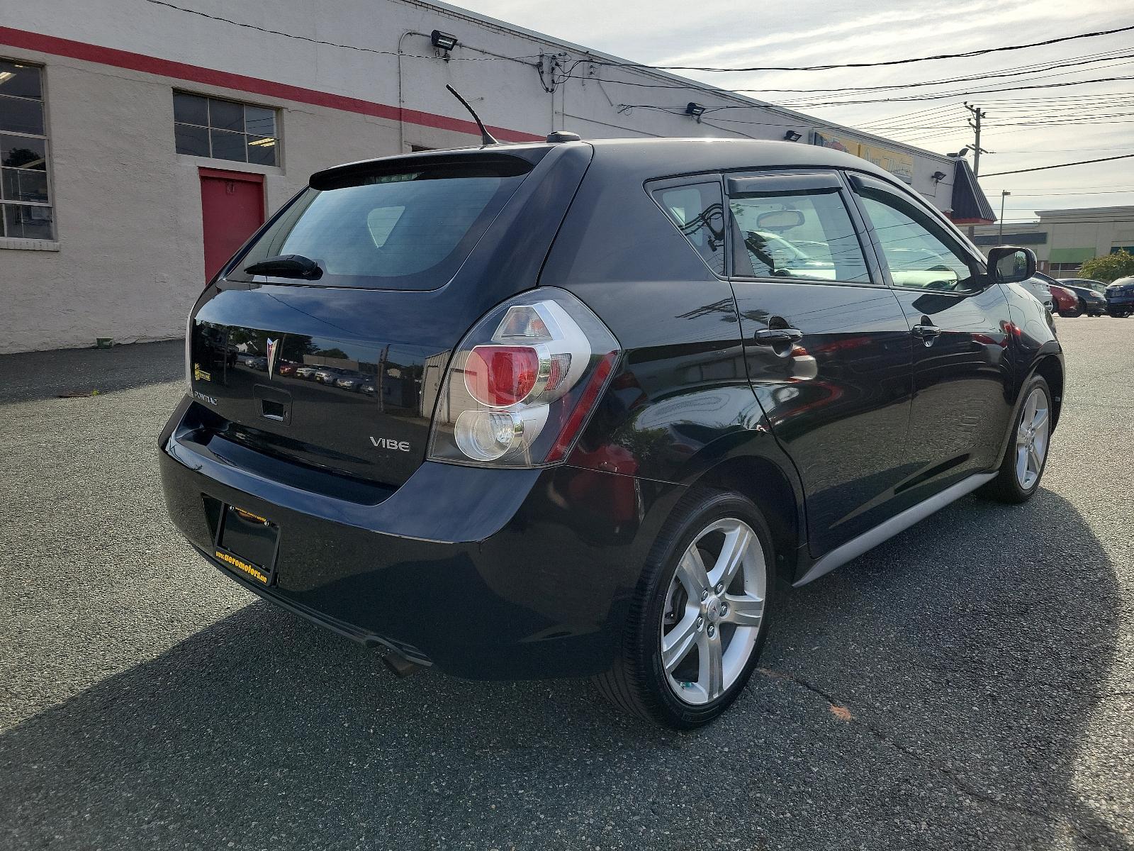 2009 Jet Black Metallic - 19U /Ebony - 14C Pontiac Vibe w/1SB (5Y2SP67059Z) with an ENGINE, 2.4L VARIABLE VALVE TIMING INTELLIGENCE 4-CYLINDER engine, located at 50 Eastern Blvd., Essex, MD, 21221, (410) 686-3444, 39.304367, -76.484947 - Rev up your daily commute with this stylish 2009 Pontiac Vibe w/1SB 4dr hb fwd w/1sb. Its radiant jet black metallic exterior and sophisticated ebony interior create a stunning visual contrast. Under the hood, the car is equipped with a 2.4L Variable Valve Timing Intelligence 4-Cylinder engine which - Photo #3
