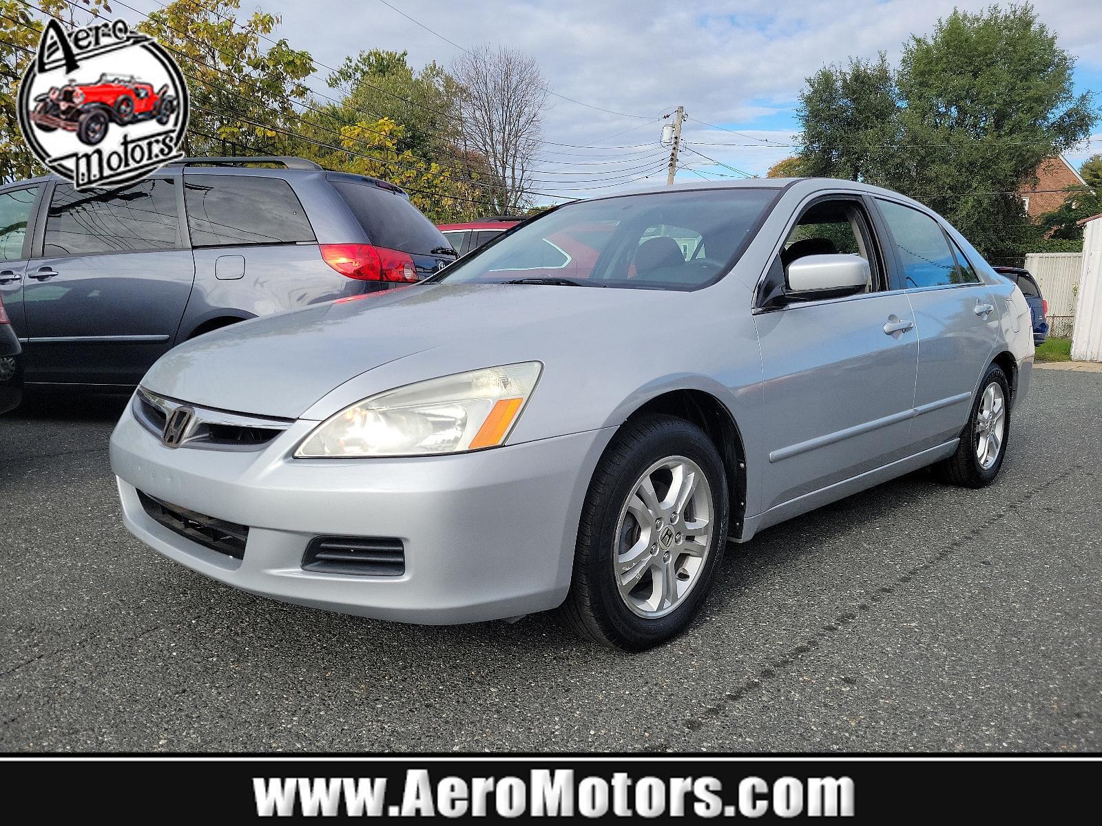 2006 Alabaster Silver Metallic - SI /Black - BK Honda Accord Sdn EX (1HGCM56766A) with an 2.4L DOHC MPFI 16-valve i-VTEC I4 engine engine, located at 50 Eastern Blvd., Essex, MD, 21221, (410) 686-3444, 39.304367, -76.484947 - Experience the synergy of comfort and reliability with this 2006 Honda Accord sedan. Dressed in a sleek silver exterior, this beauty exudes sophistication during every journey. While specific interior details are undefined, Honda is renowned for creating comfortable, highly-functional and user-frien - Photo #0