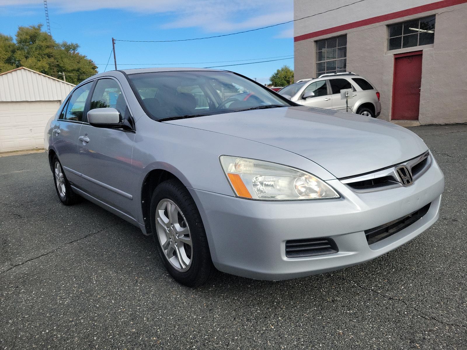 2006 Alabaster Silver Metallic - SI /Black - BK Honda Accord Sdn EX (1HGCM56766A) with an 2.4L DOHC MPFI 16-valve i-VTEC I4 engine engine, located at 50 Eastern Blvd., Essex, MD, 21221, (410) 686-3444, 39.304367, -76.484947 - Experience the synergy of comfort and reliability with this 2006 Honda Accord sedan. Dressed in a sleek silver exterior, this beauty exudes sophistication during every journey. While specific interior details are undefined, Honda is renowned for creating comfortable, highly-functional and user-frien - Photo #2