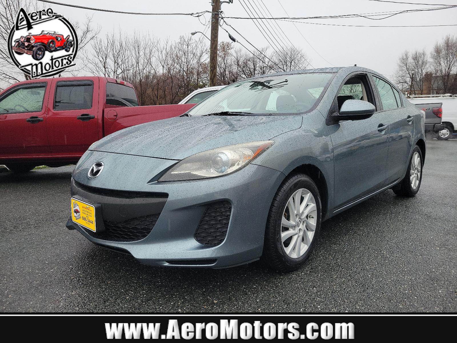 2012 Dolphin Gray Mica - 39T /Black - BU4 Mazda Mazda3 i Grand Touring (JM1BL1W88C1) with an 2.0L DOHC 16-valve SKYACTIV-G I4 engine -inc: variable valve timing (VVT) engine, located at 50 Eastern Blvd., Essex, MD, 21221, (410) 686-3444, 39.304367, -76.484947 - Discover the thrilling ride of the 2012 Mazda Mazda3 i Grand Touring 4dr Sedan Auto i Grand Touring. This vehicle showcases a sleek Dolphin Gray Mica-39T exterior, elegantly complemented by a sophisticated Black-BU4 interior that underlines its timeless appeal. Under the hood, you'll find the robust - Photo #0