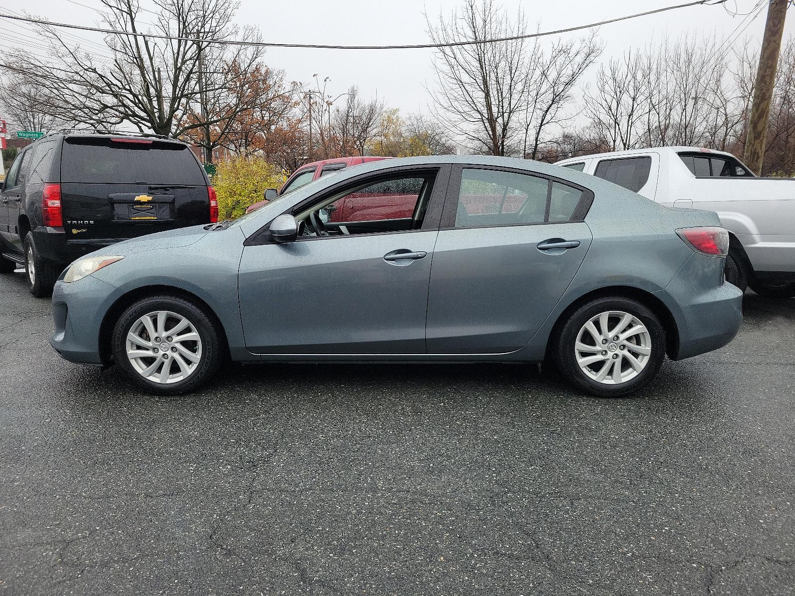 2012 Dolphin Gray Mica - 39T /Black - BU4 Mazda Mazda3 i Grand Touring (JM1BL1W88C1) with an 2.0L DOHC 16-valve SKYACTIV-G I4 engine -inc: variable valve timing (VVT) engine, located at 50 Eastern Blvd., Essex, MD, 21221, (410) 686-3444, 39.304367, -76.484947 - Discover the thrilling ride of the 2012 Mazda Mazda3 i Grand Touring 4dr Sedan Auto i Grand Touring. This vehicle showcases a sleek Dolphin Gray Mica-39T exterior, elegantly complemented by a sophisticated Black-BU4 interior that underlines its timeless appeal. Under the hood, you'll find the robust - Photo #6