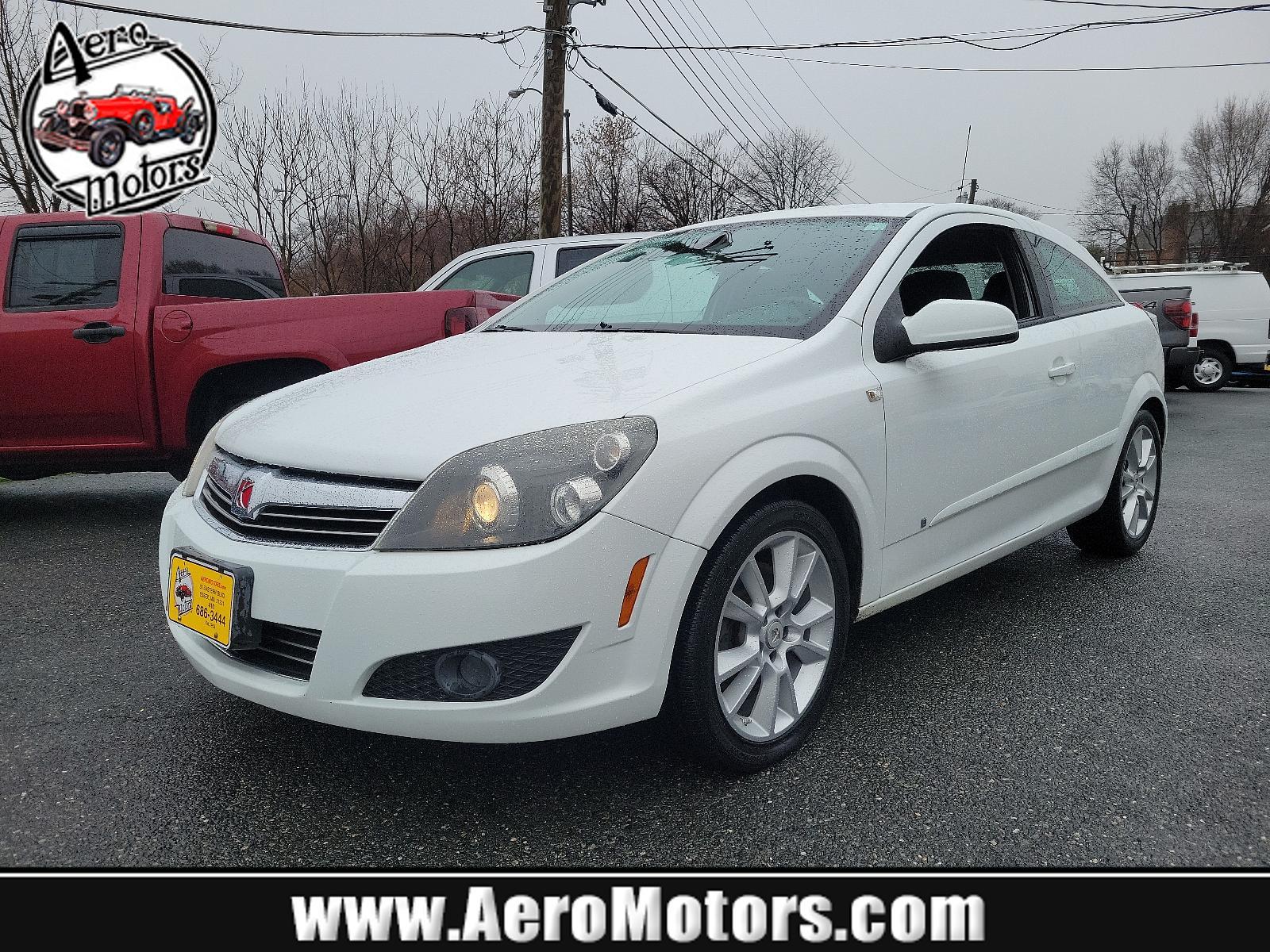 2008 Arctic White - 10U /Charcoal - 80X Saturn Astra XR (W08AT271X85) with an ENGINE, 1.8L VARIABLE VALVE TIMING DOHC 4-CYLINDER engine, located at 50 Eastern Blvd., Essex, MD, 21221, (410) 686-3444, 39.304367, -76.484947 - Immerse yourself in the driving delight and comfort with our 2008 Saturn Astra XR 3dr HB XR. Clad in a majestic Arctic White - 10U exterior coupled with a sophisticated Charcoal - 80X interior, this model exudes elegance and refinement. Under the hood lies a potent 1.8L Variable Valve Timing DOHC 4- - Photo #0