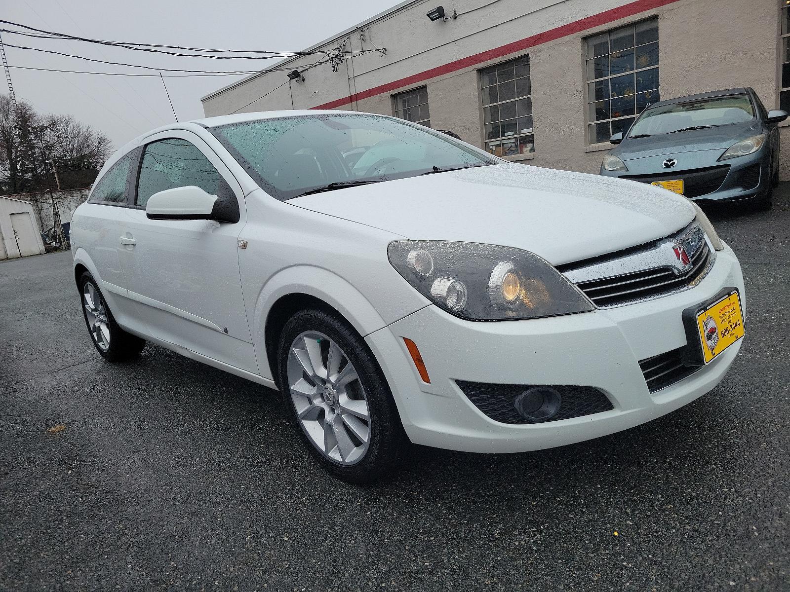 2008 Arctic White - 10U /Charcoal - 80X Saturn Astra XR (W08AT271X85) with an ENGINE, 1.8L VARIABLE VALVE TIMING DOHC 4-CYLINDER engine, located at 50 Eastern Blvd., Essex, MD, 21221, (410) 686-3444, 39.304367, -76.484947 - Immerse yourself in the driving delight and comfort with our 2008 Saturn Astra XR 3dr HB XR. Clad in a majestic Arctic White - 10U exterior coupled with a sophisticated Charcoal - 80X interior, this model exudes elegance and refinement. Under the hood lies a potent 1.8L Variable Valve Timing DOHC 4- - Photo #2