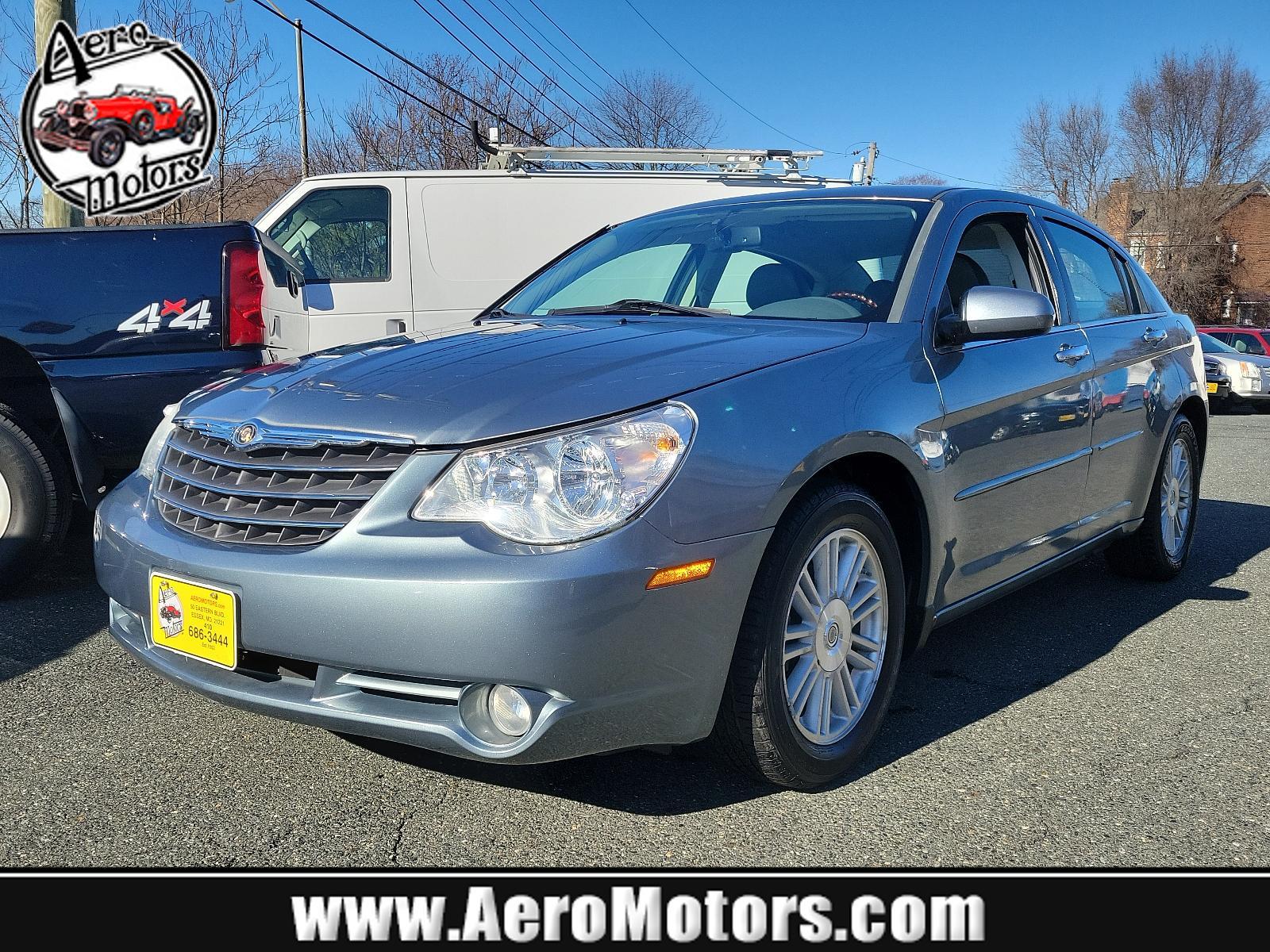 2007 Silver Steel Metallic - PA4 /Dark/Light Slate Gray - DB Chrysler Sebring Sdn Limited (1C3LC66K57N) with an 2.4L SMPI DOHC 16-VALVE I4 DUAL VVT ENGINE engine, located at 50 Eastern Blvd., Essex, MD, 21221, (410) 686-3444, 39.304367, -76.484947 - Discover the perfect blend of style, comfort and performance with this 2007 Chrysler Sebring Sdn Limited 4dr. Finished in an alluring Silver Steel Metallic - PA4 exterior paired beautifully with the plush Dark/Light Slate Gray - DB interior, it exhibits a sleek, chic aesthetic that's sure to turn he - Photo #0