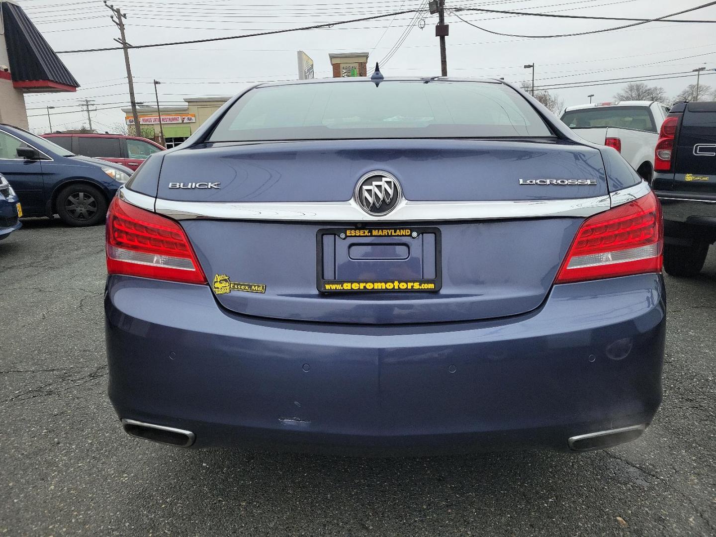 2014 Atlantis Blue Metallic - GWY /Ebony - H0Y Buick LaCrosse Leather (1G4GB5G3XEF) with an ENGINE, 3.6L SIDI DOHC V6 VVT engine, located at 50 Eastern Blvd., Essex, MD, 21221, (410) 686-3444, 39.304367, -76.484947 - Experience the epitome of luxury and performance with our stunning 2014 Buick LaCrosse Leather 4dr Sedan. Rising above the ordinary with an eye-catching Atlantis Blue Metallic exterior, this car is a proud testament to Buick's classic aesthetics. Complementing the beautiful exterior is an Ebony inte - Photo#4